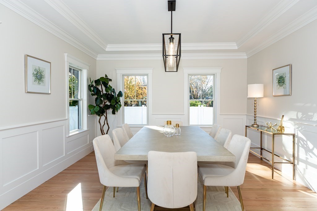 4 Whitcomb Street Natick, MA 01760 - Photo 10 of 42 a view of a dining room with furniture window and wooden floor