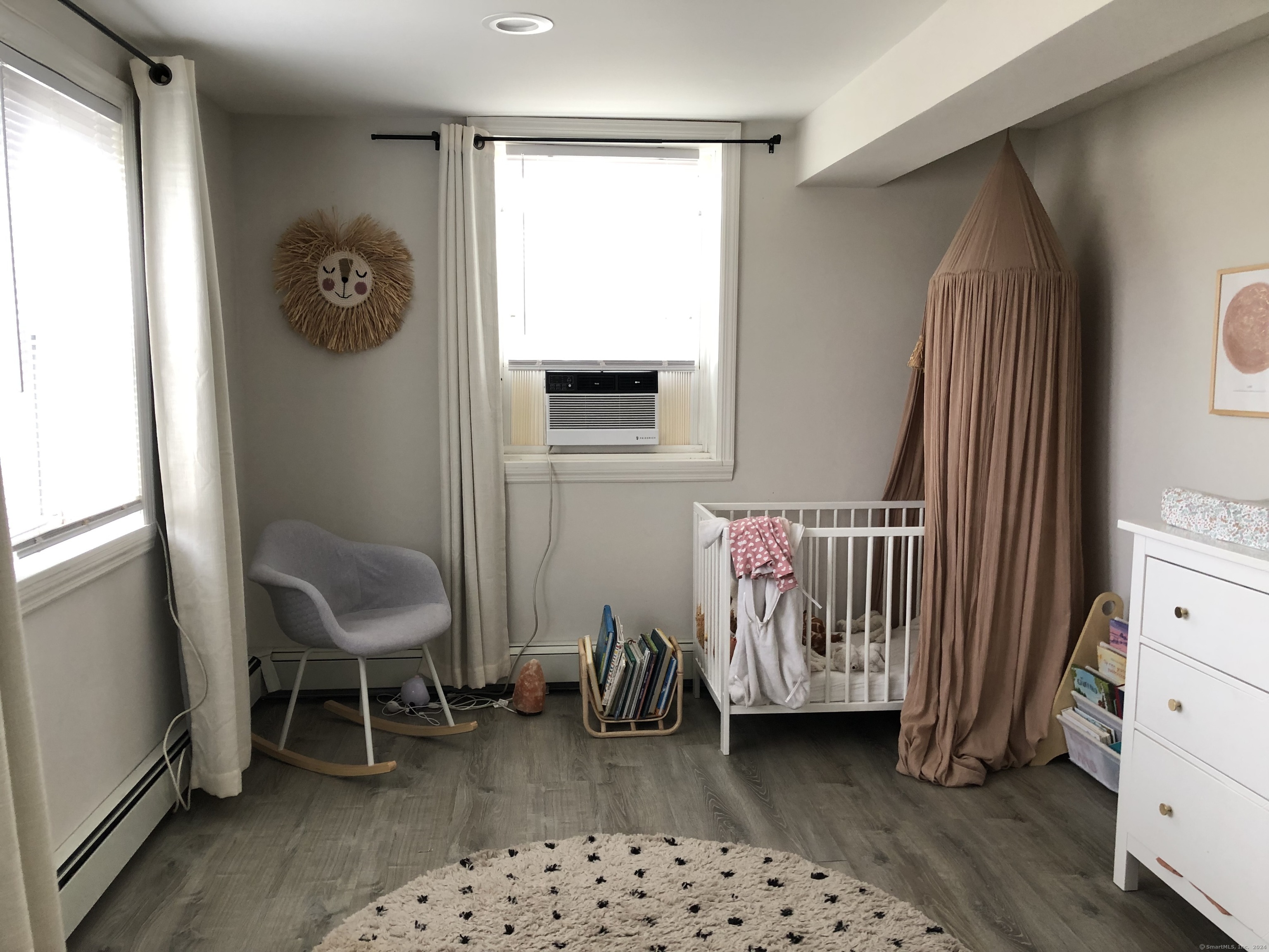 90 Iroquois Road, Unit A Stamford, CT 06902 - Photo 11 of 19 a bedroom with a chair and a window