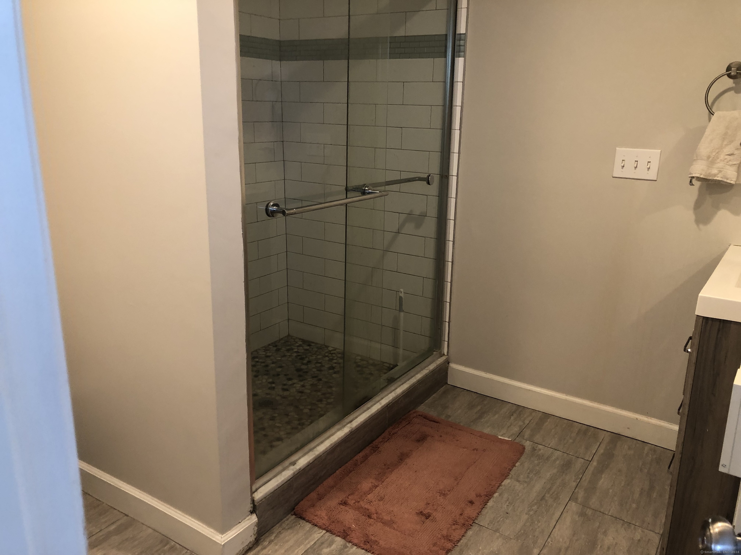 90 Iroquois Road, Unit A Stamford, CT 06902 - Photo 15 of 19 a bathroom with a shower