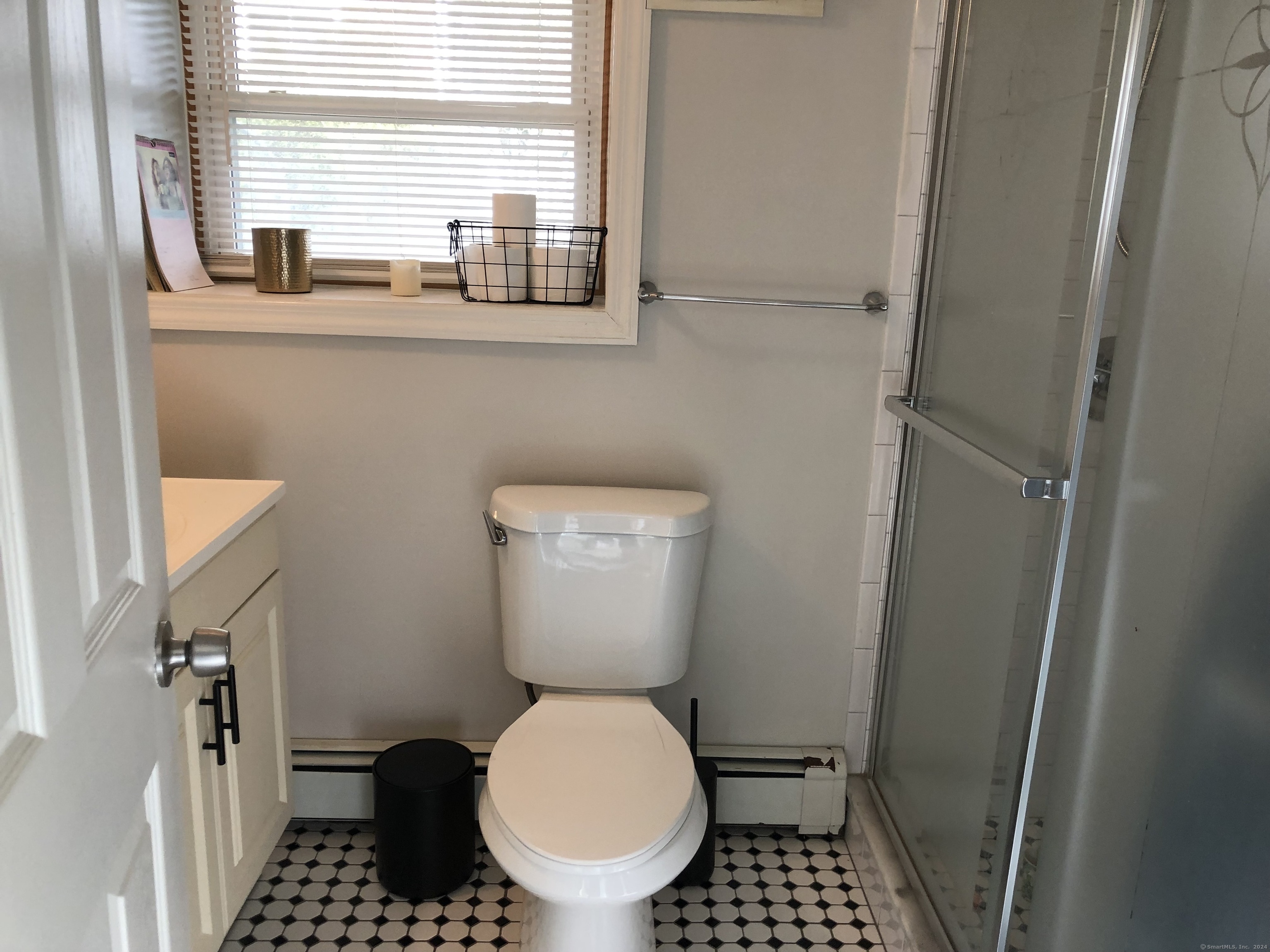 90 Iroquois Road, Unit A Stamford, CT 06902 - Photo 16 of 19 a bathroom with a toilet and a shower