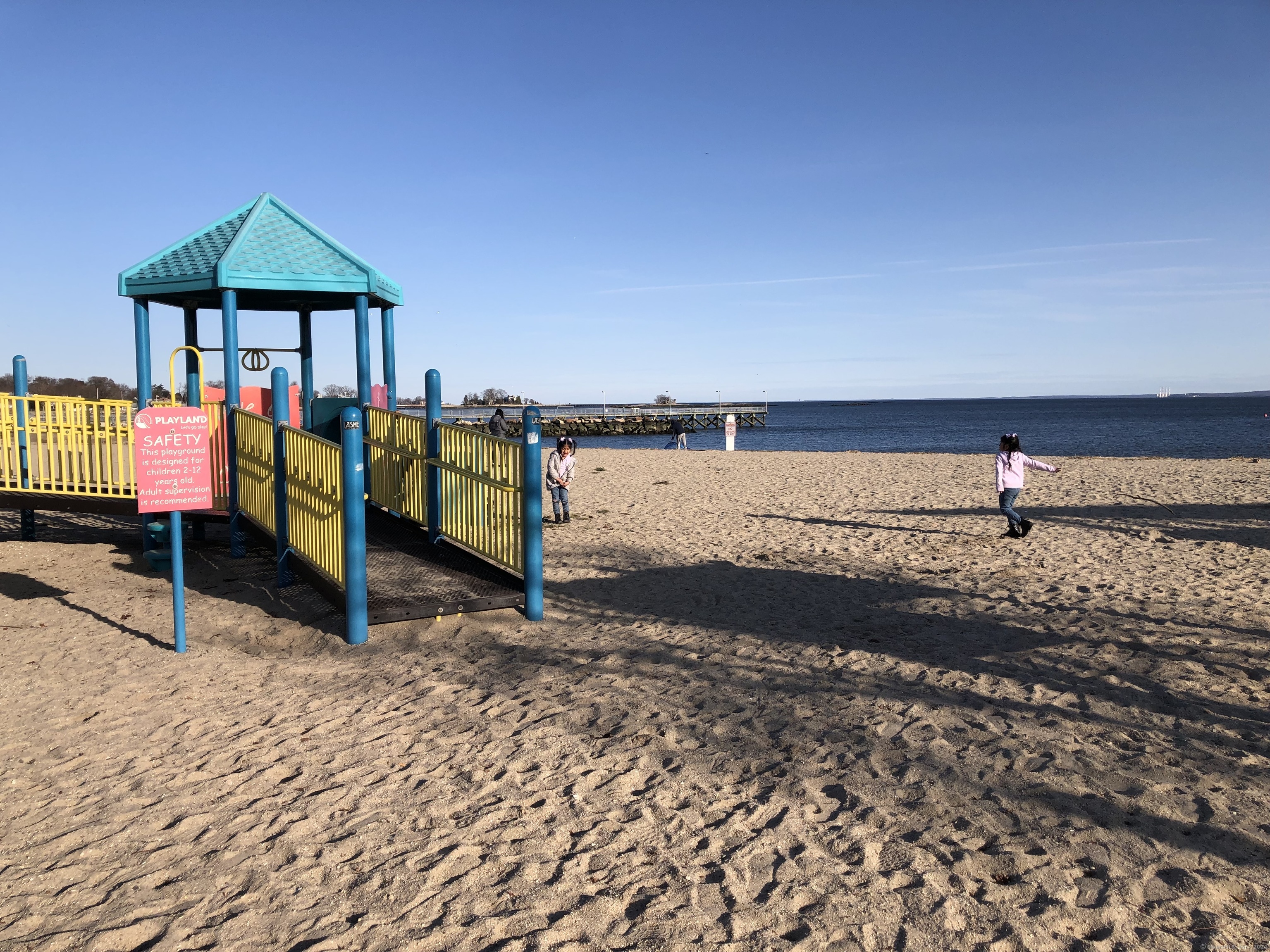 90 Iroquois Road, Unit A Stamford, CT 06902 - Photo 4 of 19 a view of a terrace with a bench
