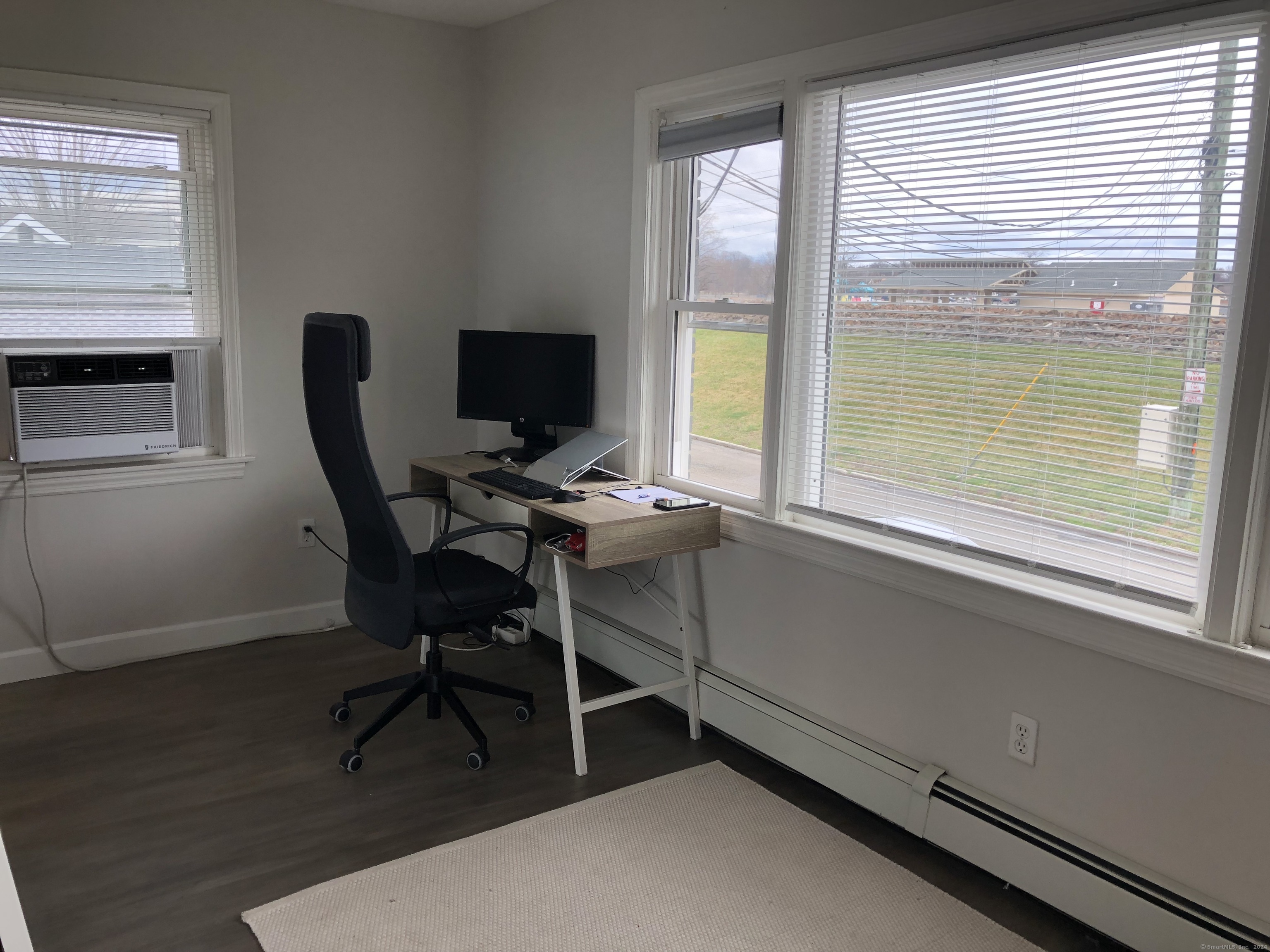 90 Iroquois Road, Unit A Stamford, CT 06902 - Photo 9 of 19 a view of a workspace with a window