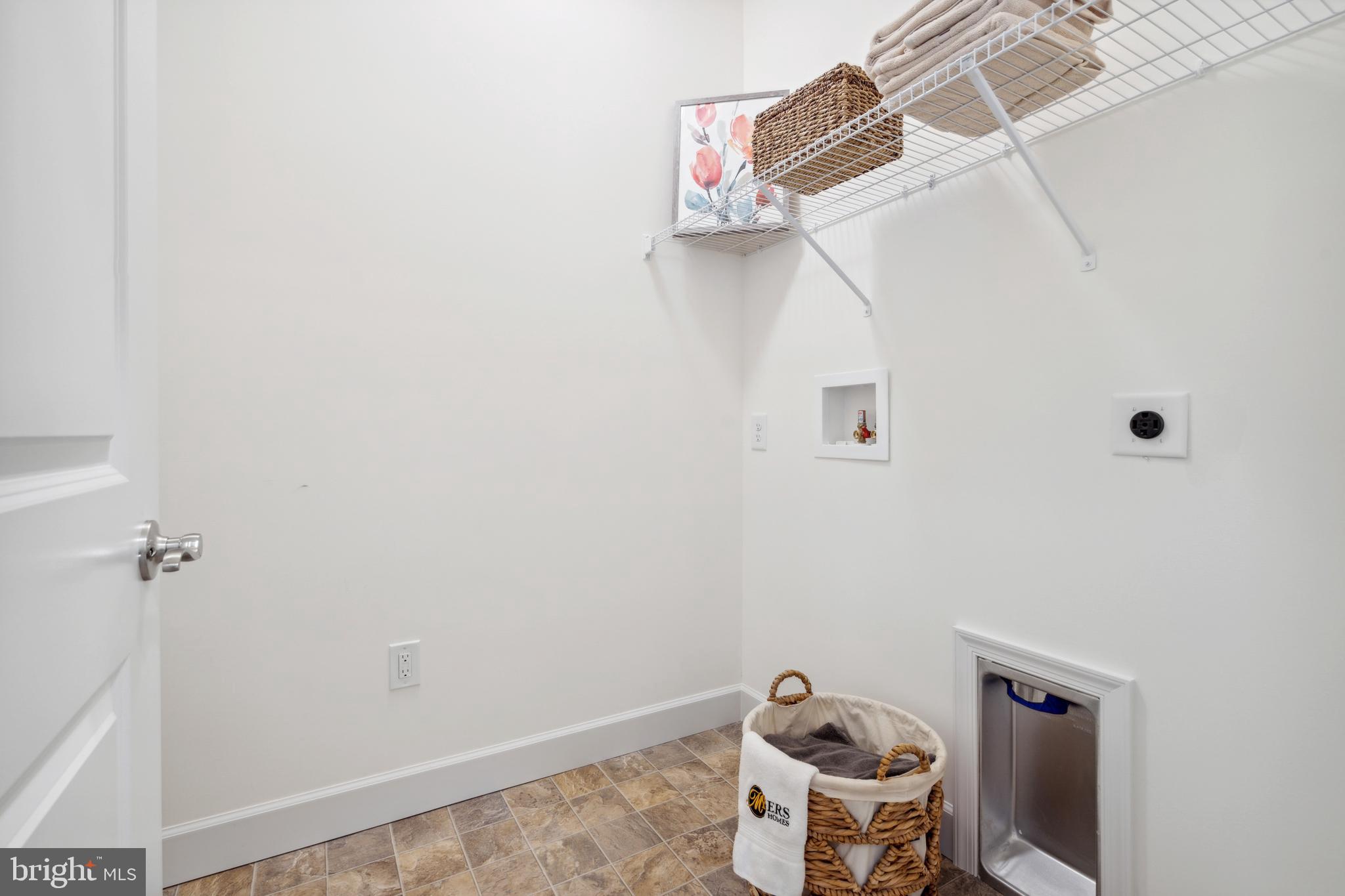 116 Flint Drive Hanover, PA 17331 - Photo 16 of 21 a view of a room with racks on the wall