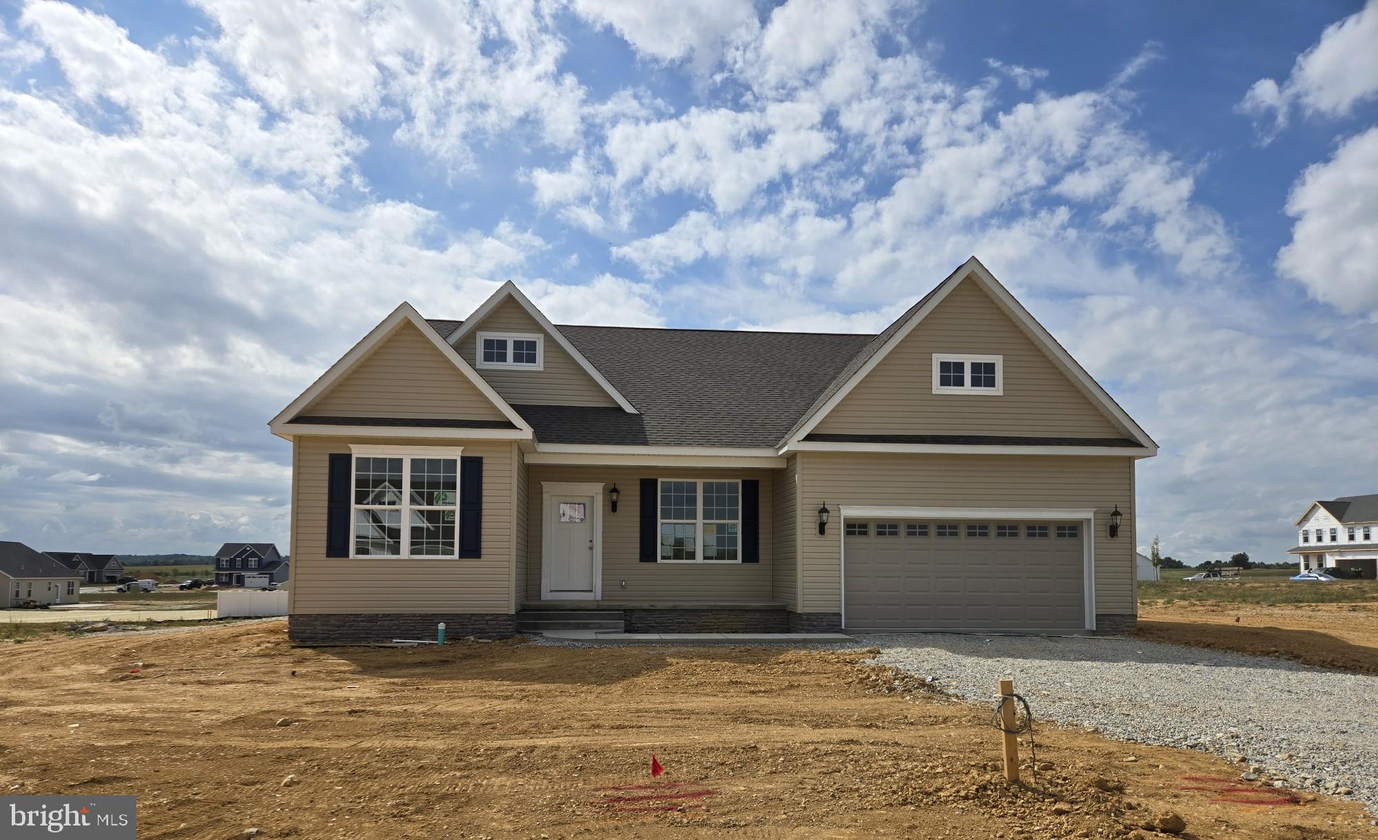 116 Flint Drive Hanover, PA 17331 - Photo 2 of 21 a front view of a house with a garden and yard