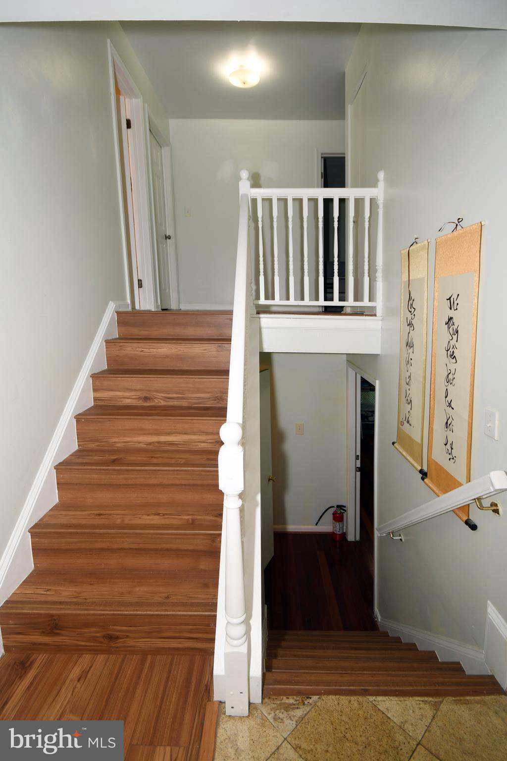 1402 Mullins Street Silver Spring, MD 20904 - Photo 11 of 29 a view of entryway and hall with wooden floor
