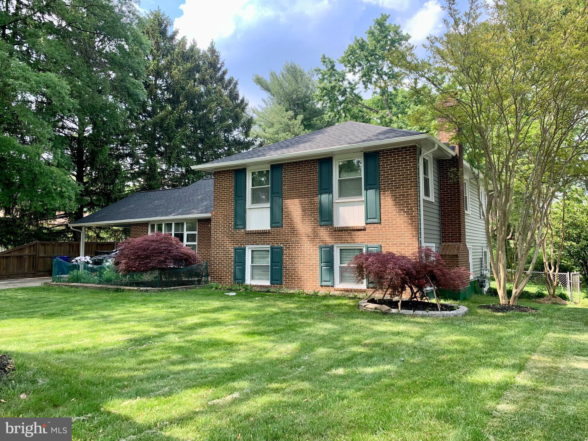 1402 Mullins Street Silver Spring, MD 20904 - Photo 2 of 29 a view of a house with a yard and sitting area
