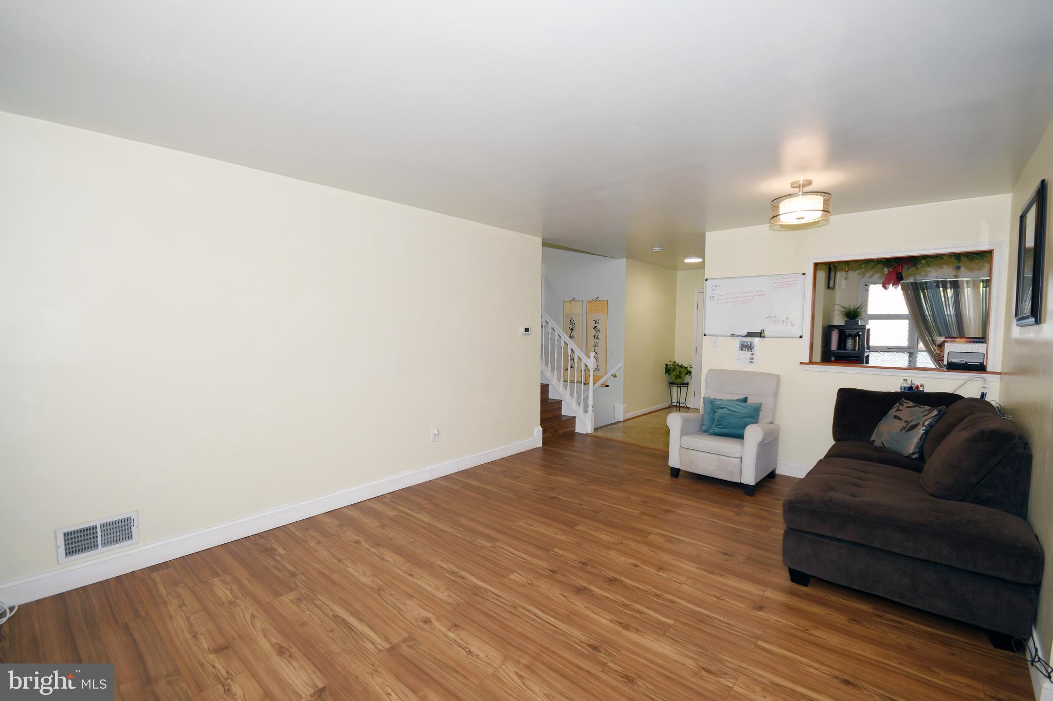 1402 Mullins Street Silver Spring, MD 20904 - Photo 5 of 29 a living room with furniture and wooden floor