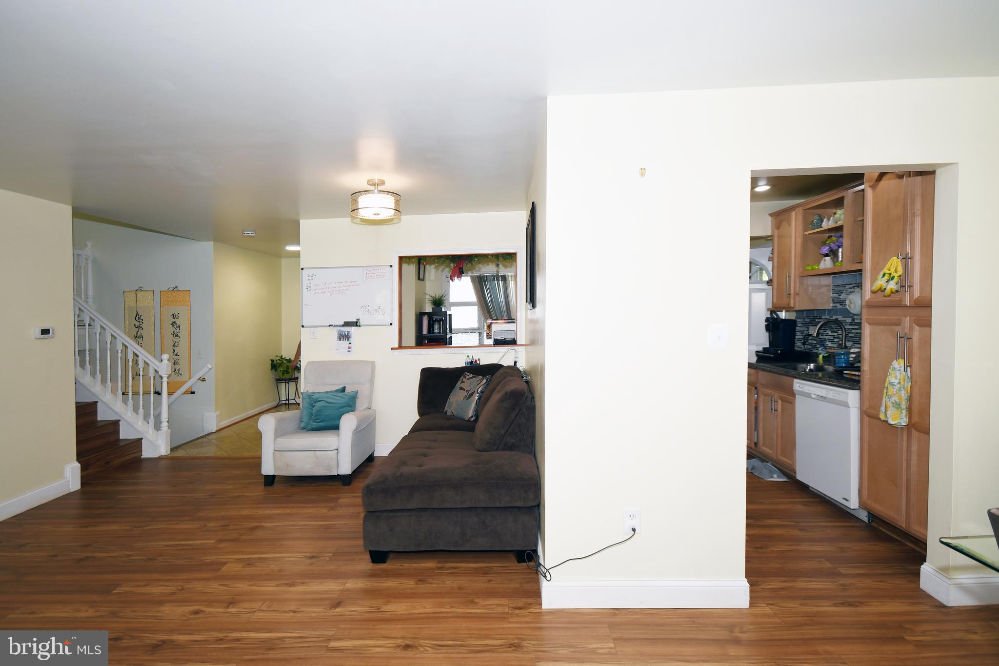 1402 Mullins Street Silver Spring, MD 20904 - Photo 6 of 29 a living room with furniture and a wooden floor