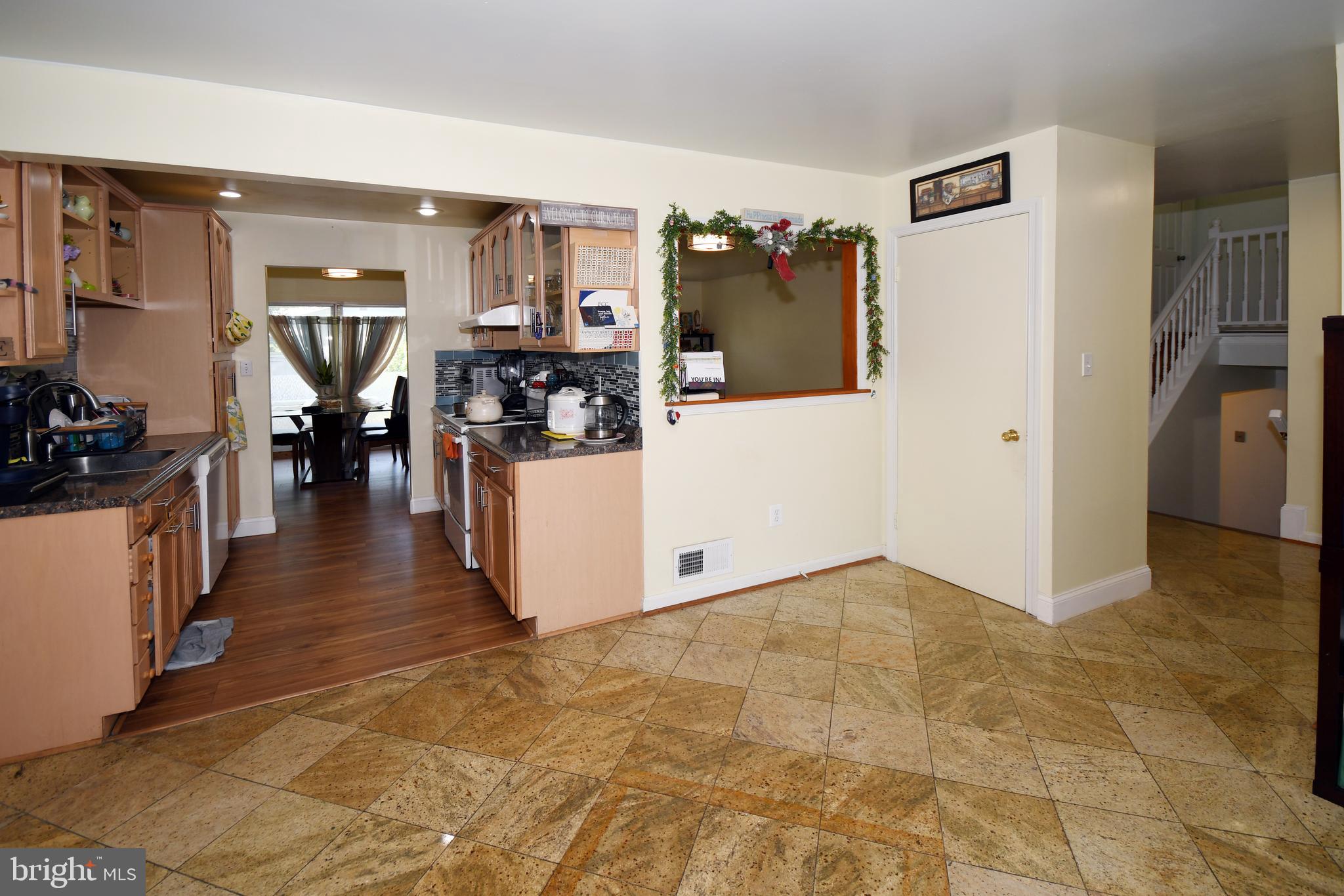1402 Mullins Street Silver Spring, MD 20904 - Photo 8 of 29 a view of a livingroom with furniture and kitchen area