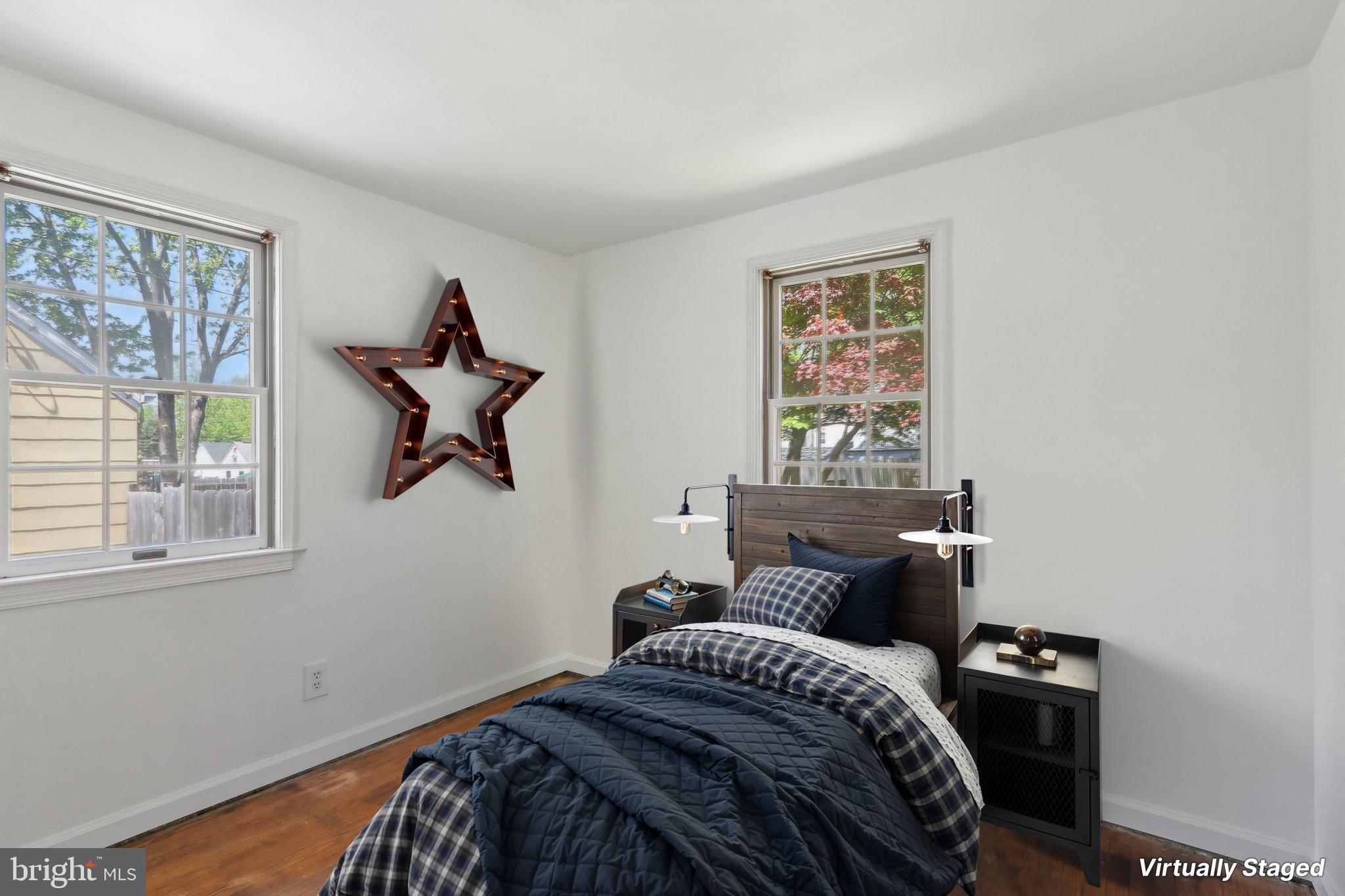 28 Barbara Road Hatboro, PA 19040 - Photo 18 of 33 a bedroom with a bed and wooden floor