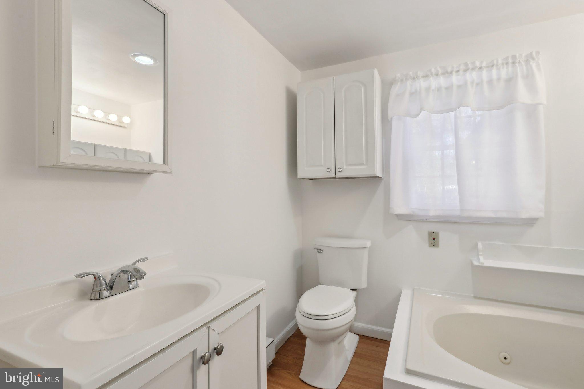 28 Barbara Road Hatboro, PA 19040 - Photo 20 of 33 a bathroom with a sink a toilet and bathtub