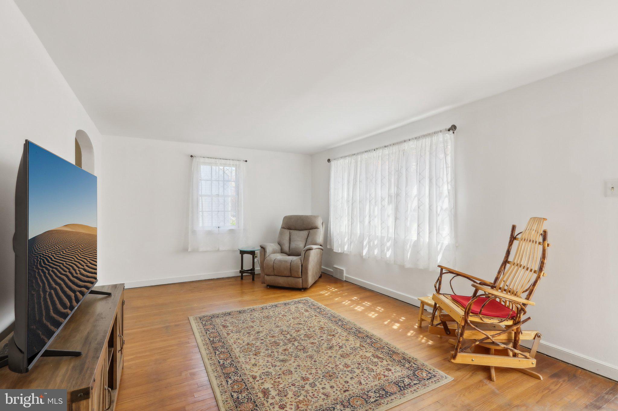 28 Barbara Road Hatboro, PA 19040 - Photo 4 of 33 a living room with furniture and a rug