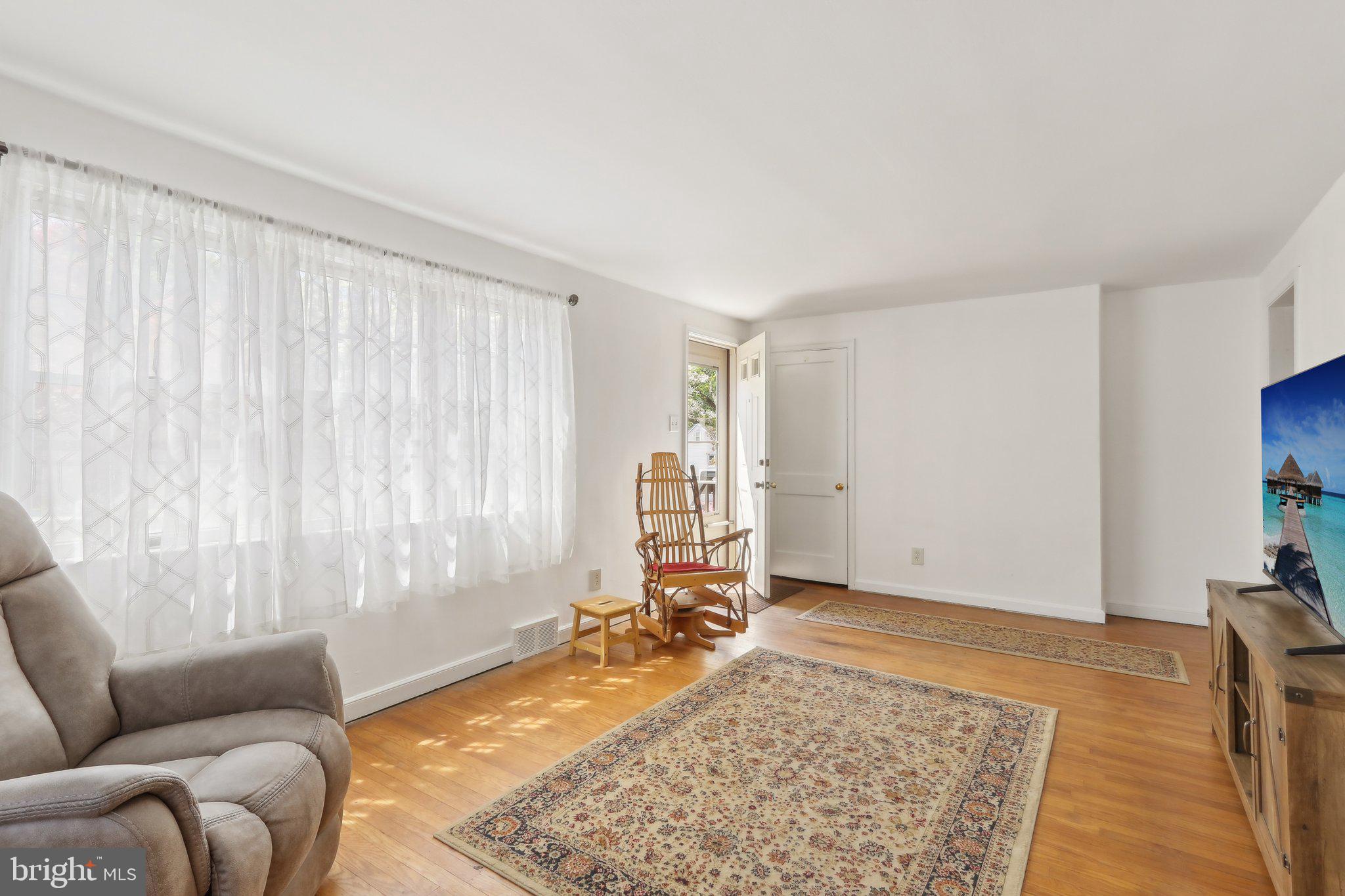 28 Barbara Road Hatboro, PA 19040 - Photo 5 of 33 a living room with furniture and a rug