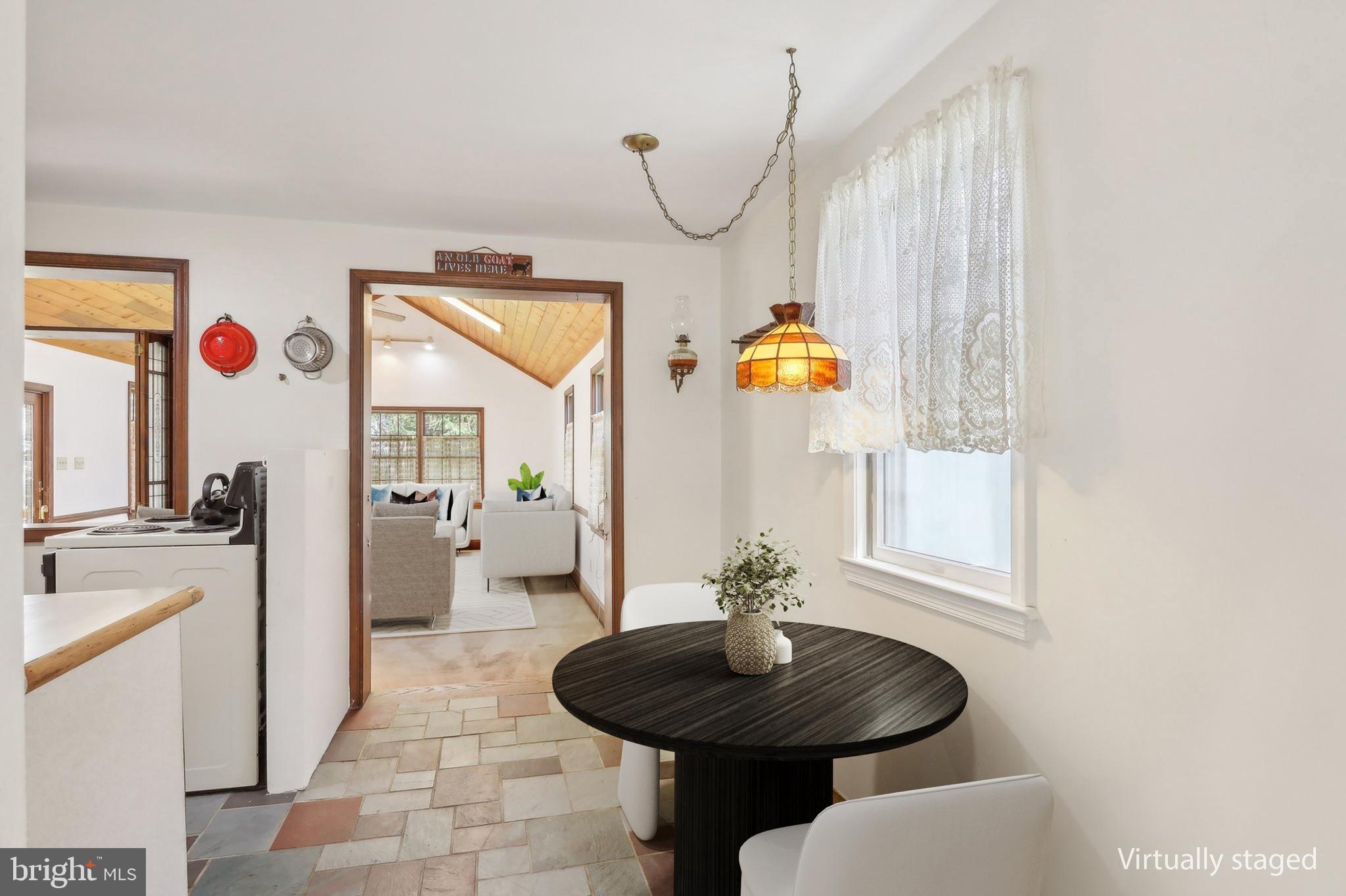 28 Barbara Road Hatboro, PA 19040 - Photo 6 of 33 a view of a dining room with furniture wooden floor and a chandelier