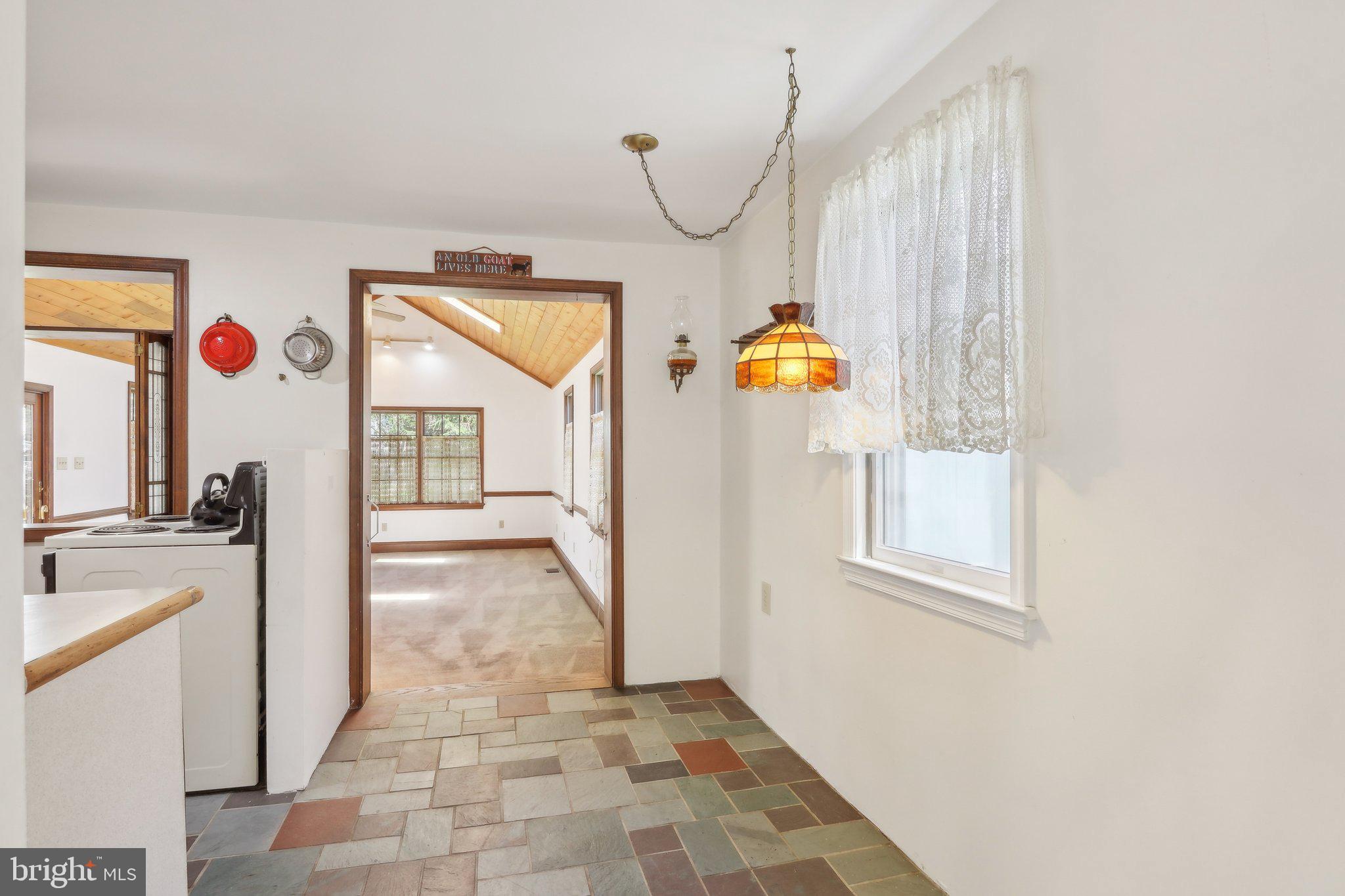 28 Barbara Road Hatboro, PA 19040 - Photo 7 of 33 a view of a hallway to rooms and a fireplace