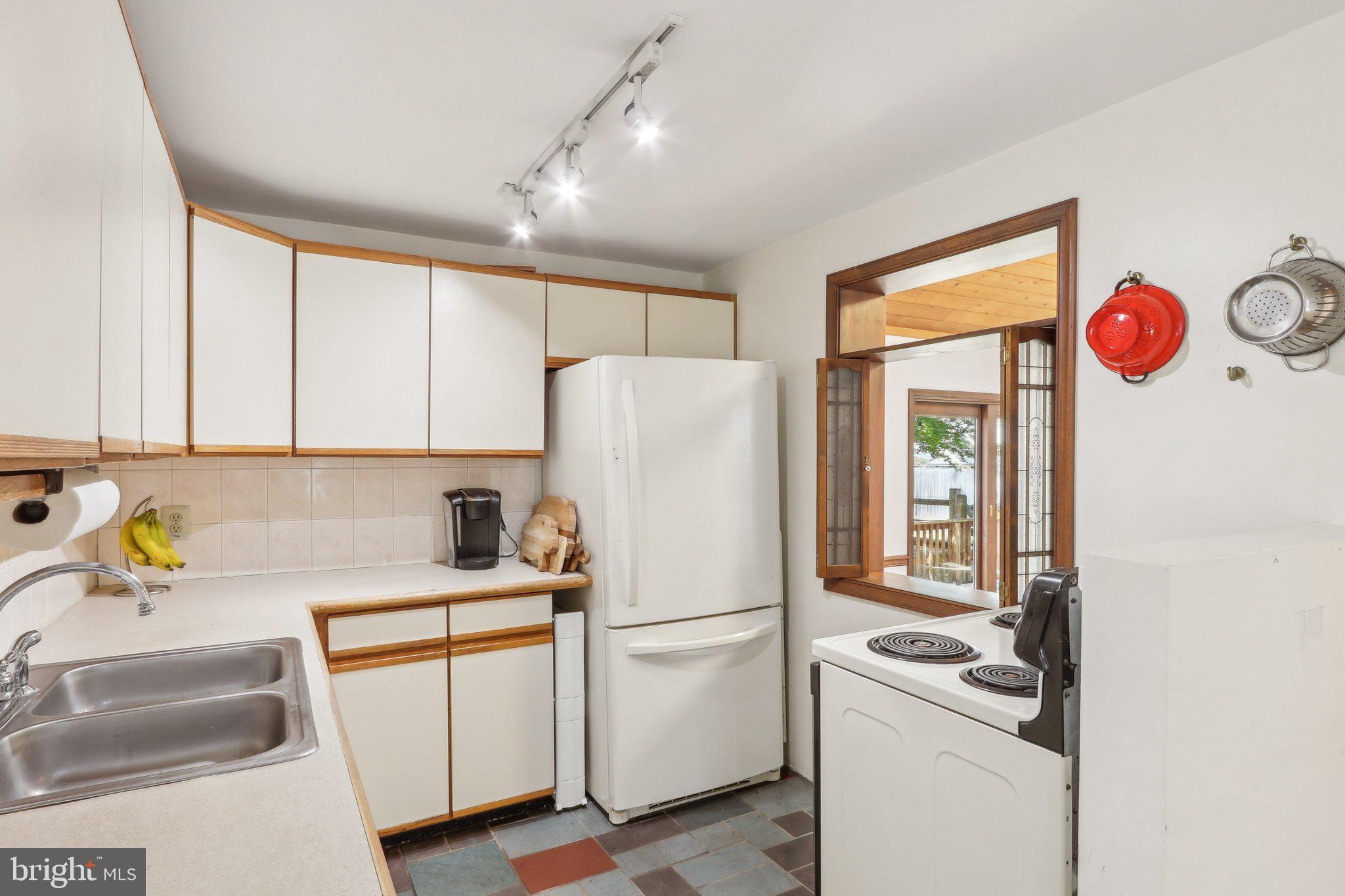 28 Barbara Road Hatboro, PA 19040 - Photo 8 of 33 a white refrigerator freezer sitting in a kitchen