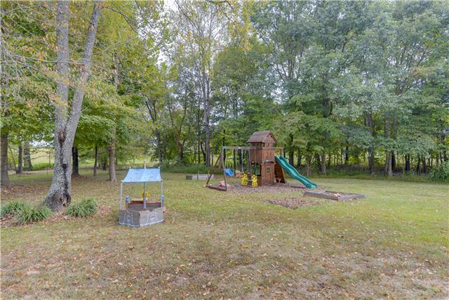 396 Pee Dee Branch Road, Unit 396B Cottontown, TN 37048 - Photo 20 of 20 The Spacious Side Yard offers room to play and enjoy the tranquility of this lovely home. Play Center does NOT remain. Thank you for viewing and don't forget to check out the Virtual Tour.