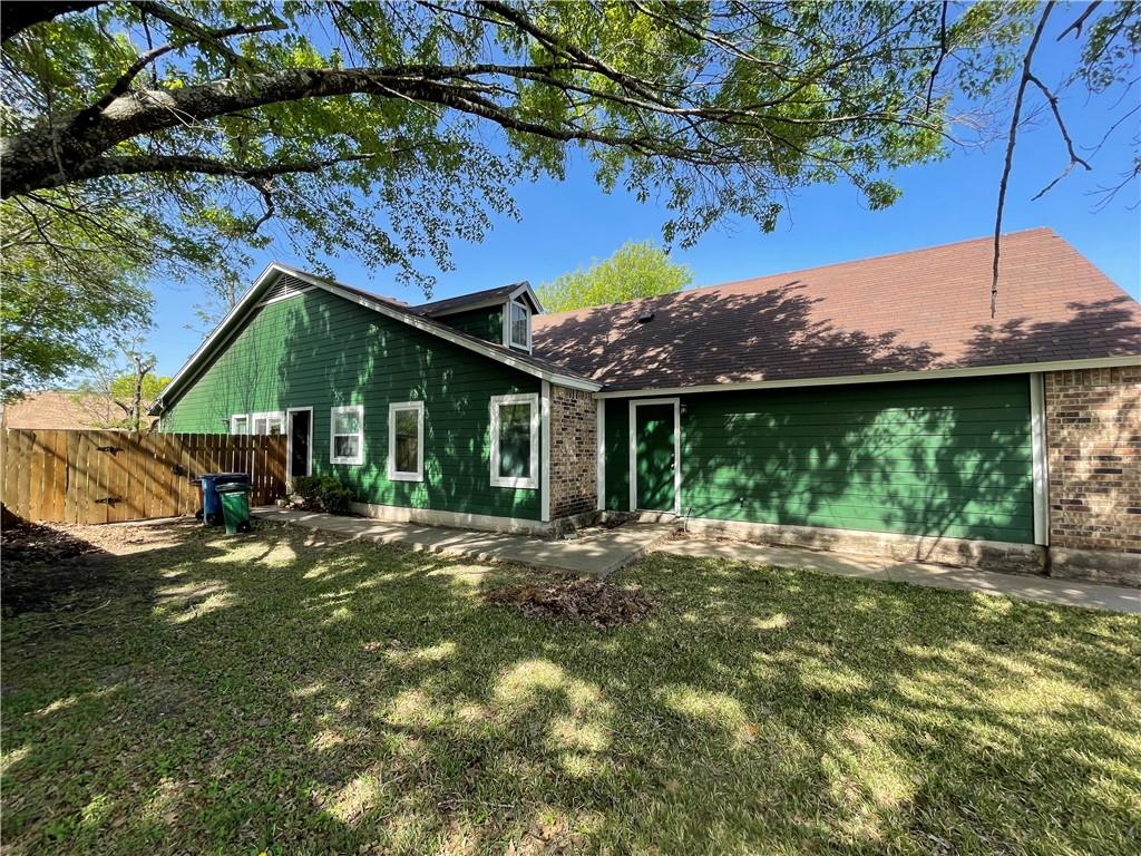 10003 Parliament House Road Austin, TX 78717 - Photo 16 of 31 a front view of a house with a garden