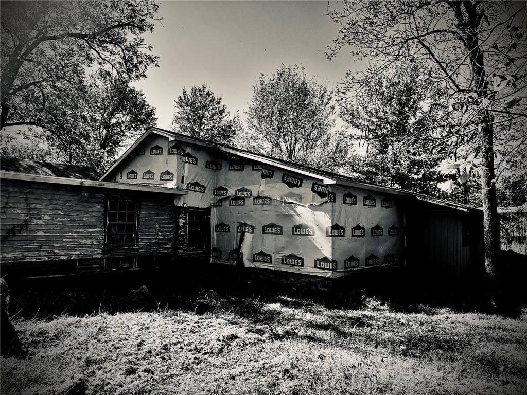 2250 West Kaufman Street Paris, TX 75460 - Photo 26 of 36 a view of house with outdoor space