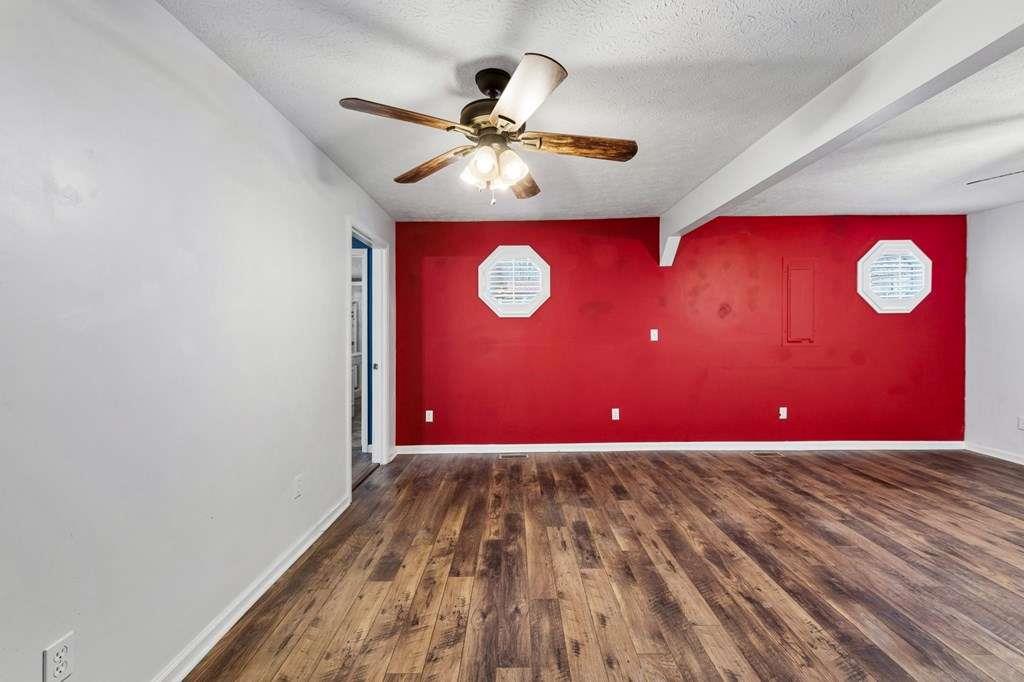 118 Jordan Road Blairsville, GA 30512 - Photo 4 of 49 a view of an empty room with wooden floor