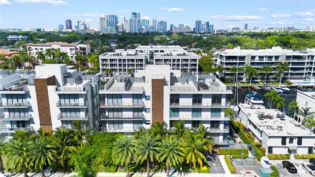 a view of living room with furniture and wooden floor