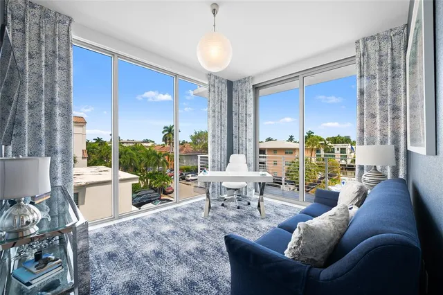 a view of swimming pool with outdoor seating
