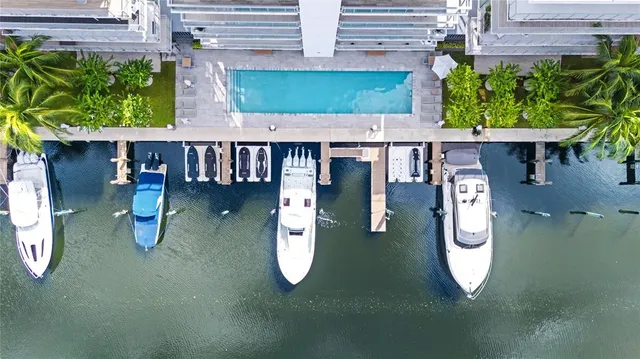 a kitchen with stainless steel appliances a microwave a sink a stove and refrigerator
