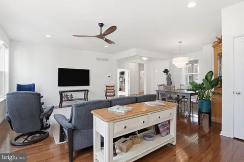 a view of a livingroom with furniture and a flat screen tv