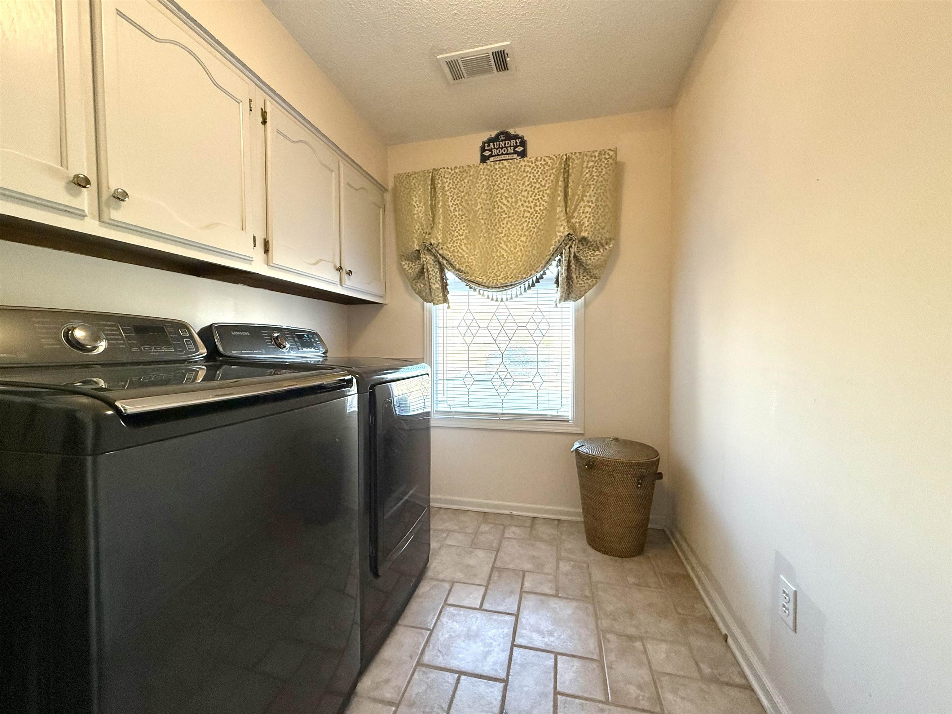 825 North Walnut Bend Road Memphis, TN 38018 - Photo 18 of 40 a kitchen with a sink and cabinets