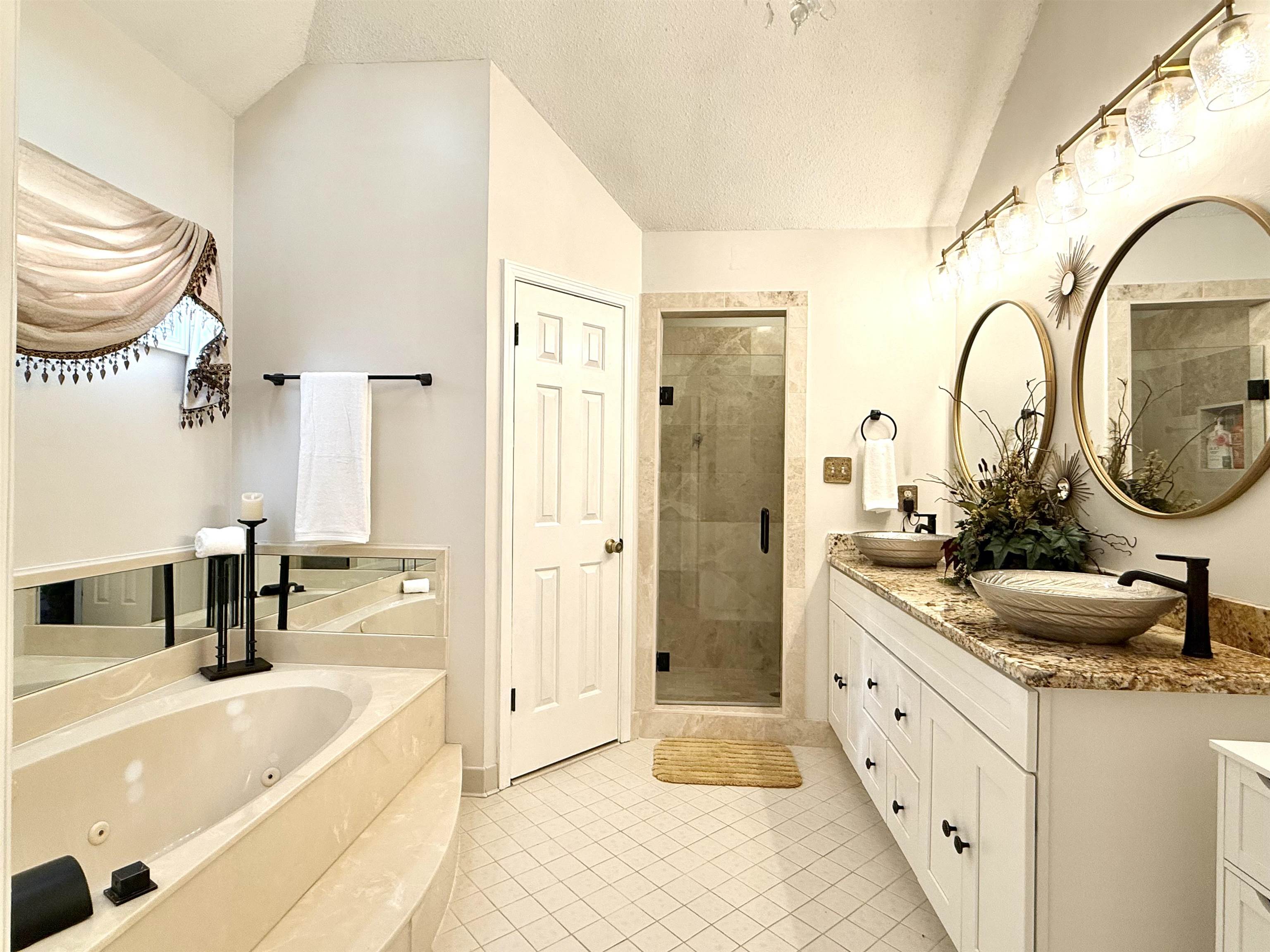 825 North Walnut Bend Road Memphis, TN 38018 - Photo 21 of 40 a bathroom with a granite countertop sink mirror and bathtub