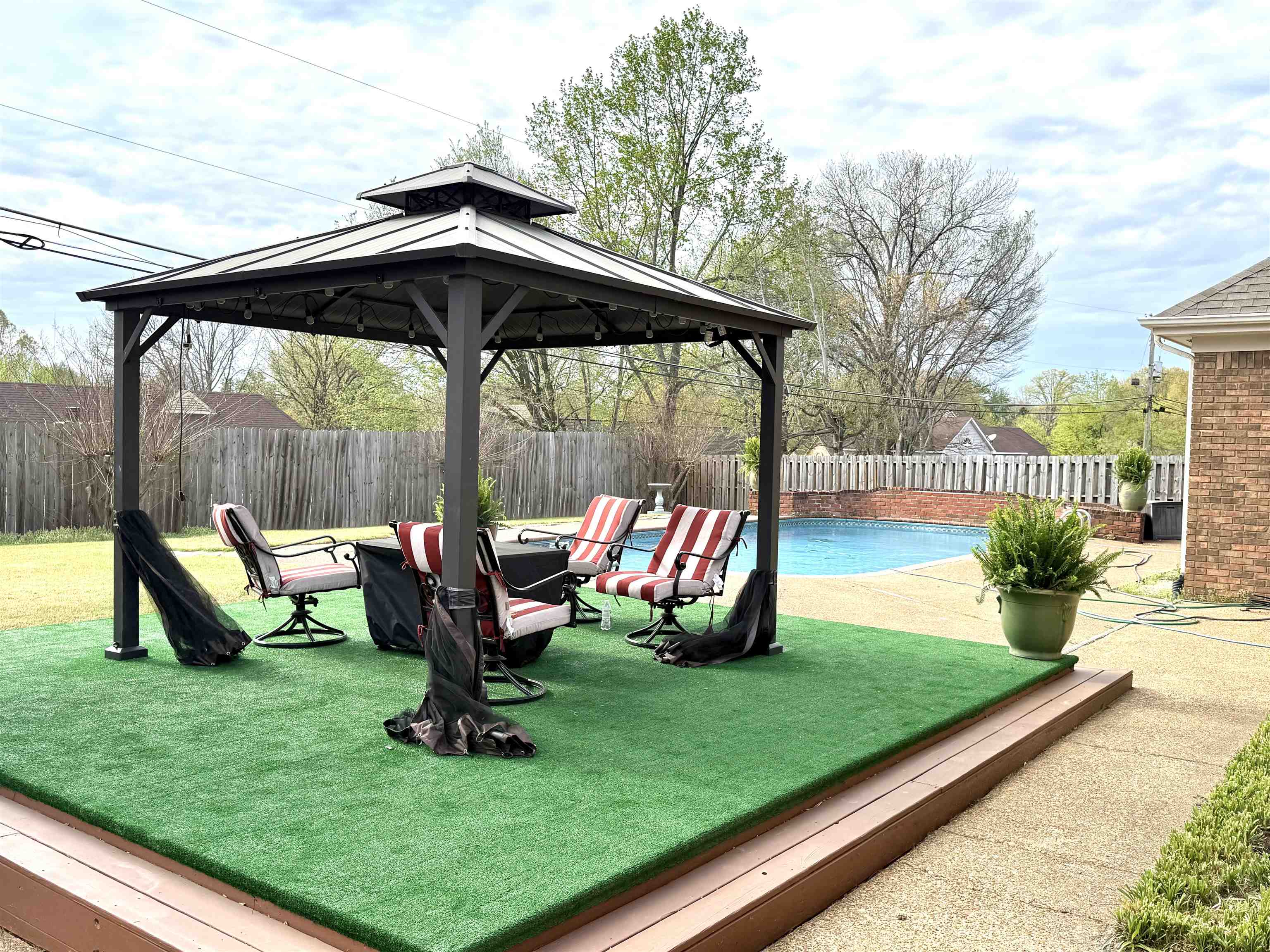 825 North Walnut Bend Road Memphis, TN 38018 - Photo 3 of 40 a view of a bench in the backyard