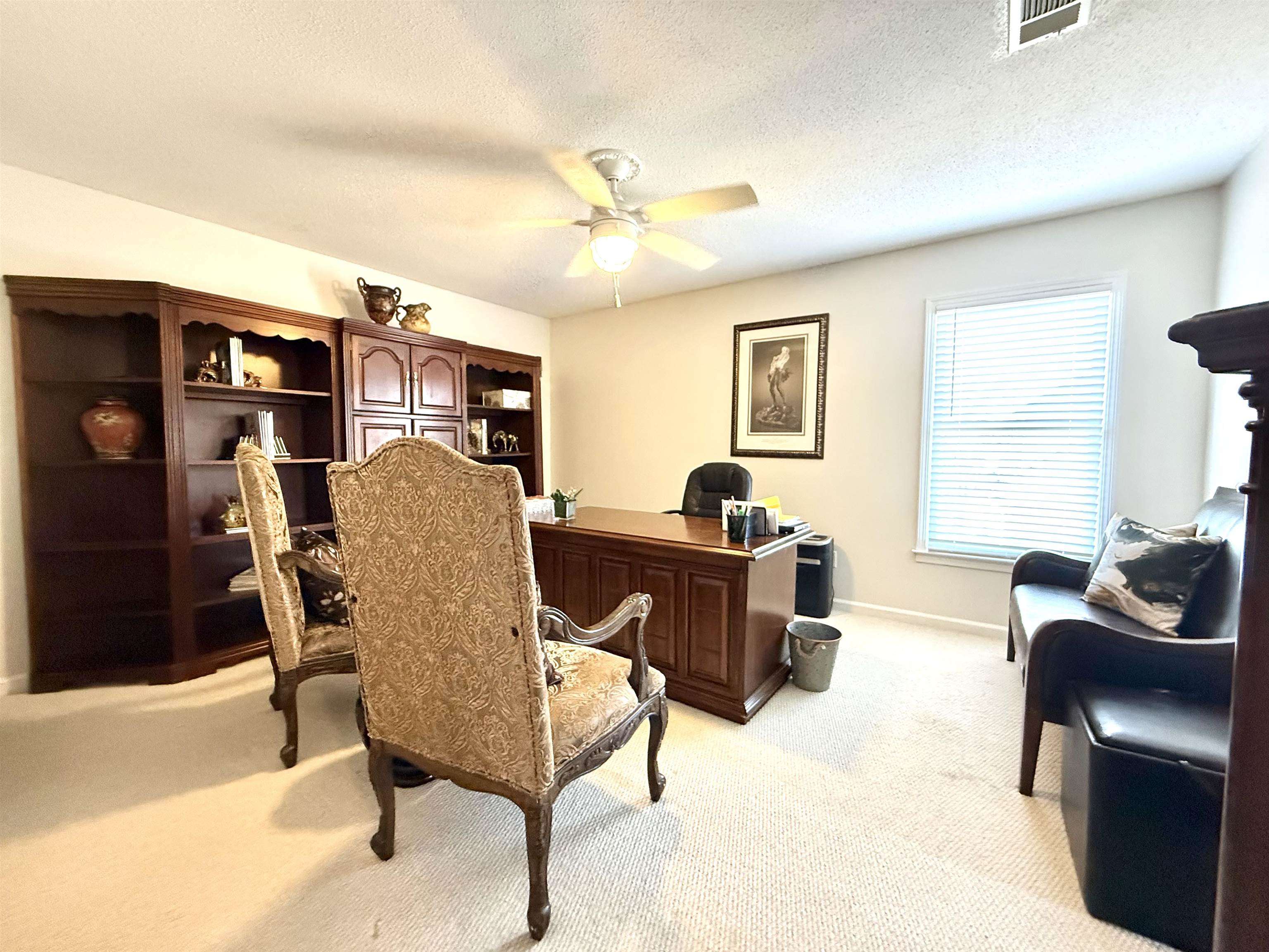 825 North Walnut Bend Road Memphis, TN 38018 - Photo 31 of 40 a living room with furniture and a window