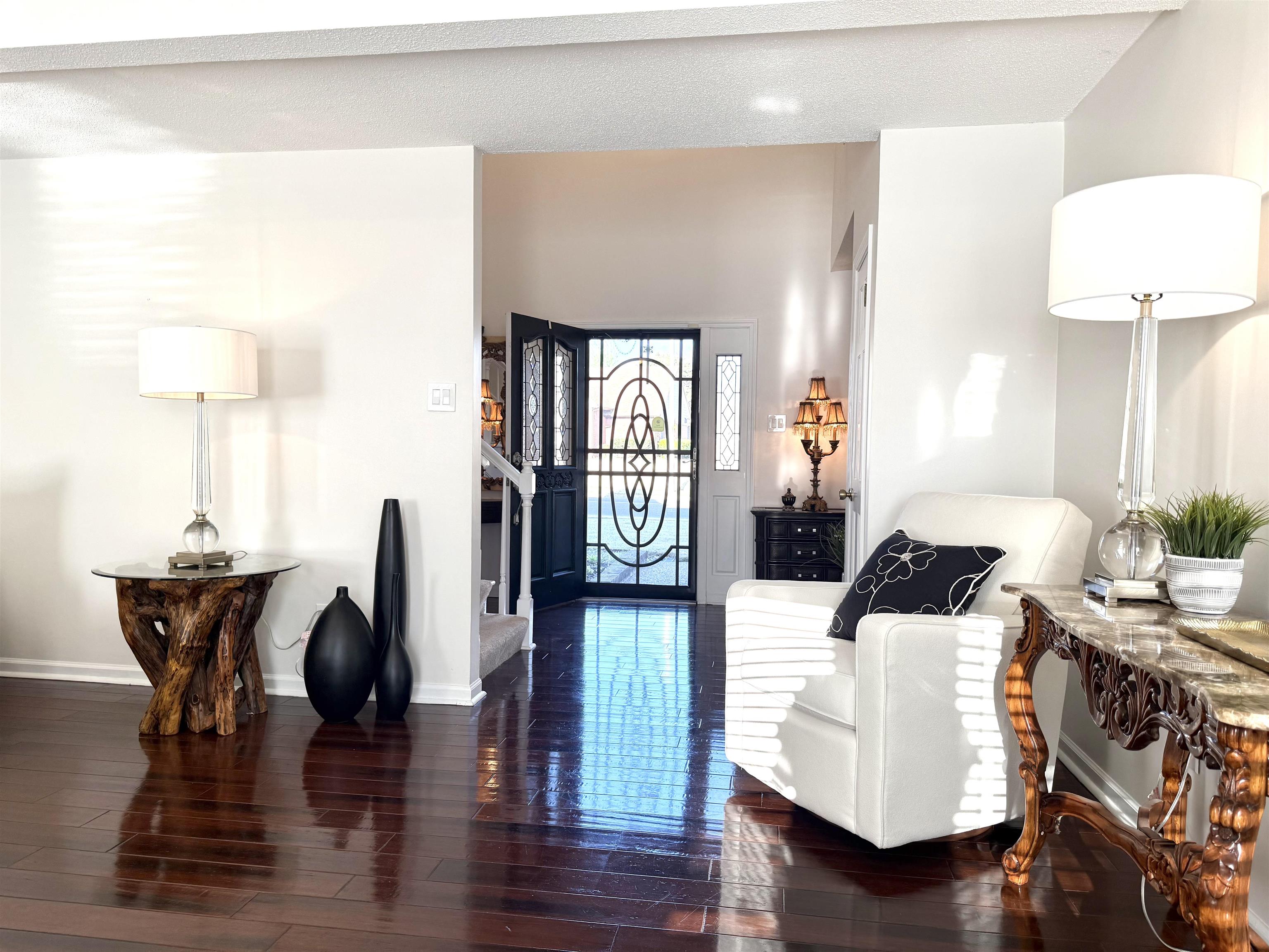 825 North Walnut Bend Road Memphis, TN 38018 - Photo 5 of 40 a living room with furniture and wooden floor