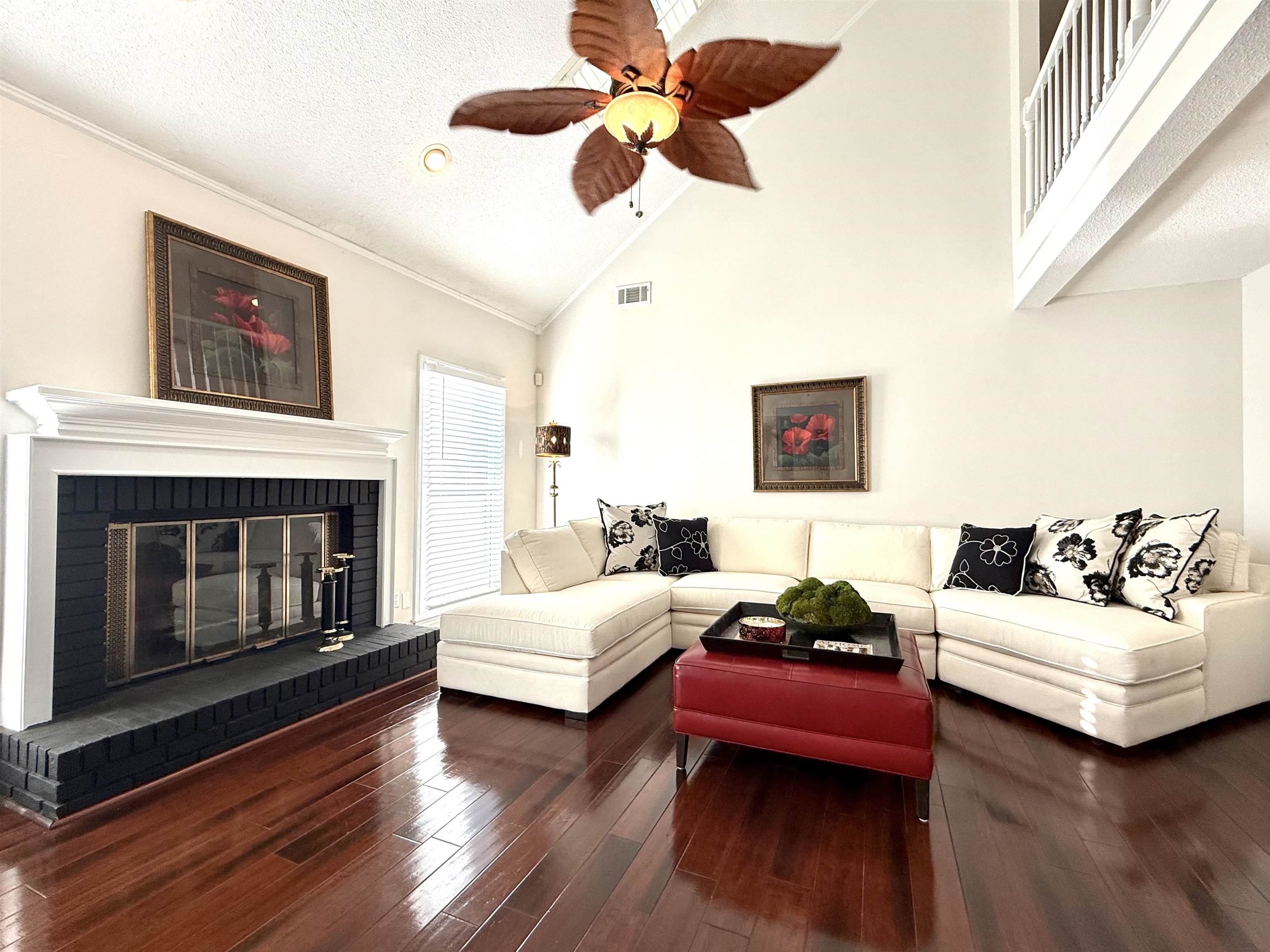 825 North Walnut Bend Road Memphis, TN 38018 - Photo 6 of 40 a bedroom with a bed couch and a fireplace