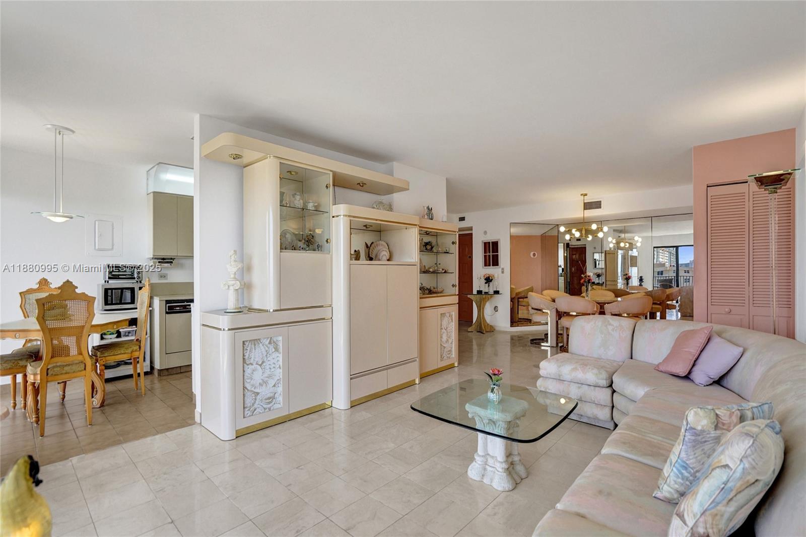 1201 South Ocean Drive, Unit 1010S Hollywood, FL 33019 - Photo 14 of 41 a living room with furniture and white kitchen