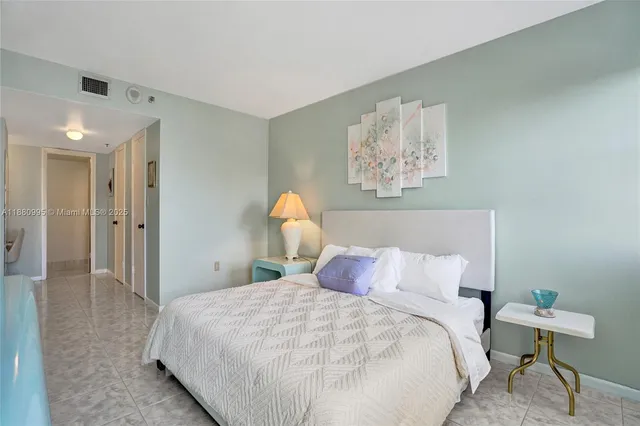 a view of a bathroom with a sink and a mirror