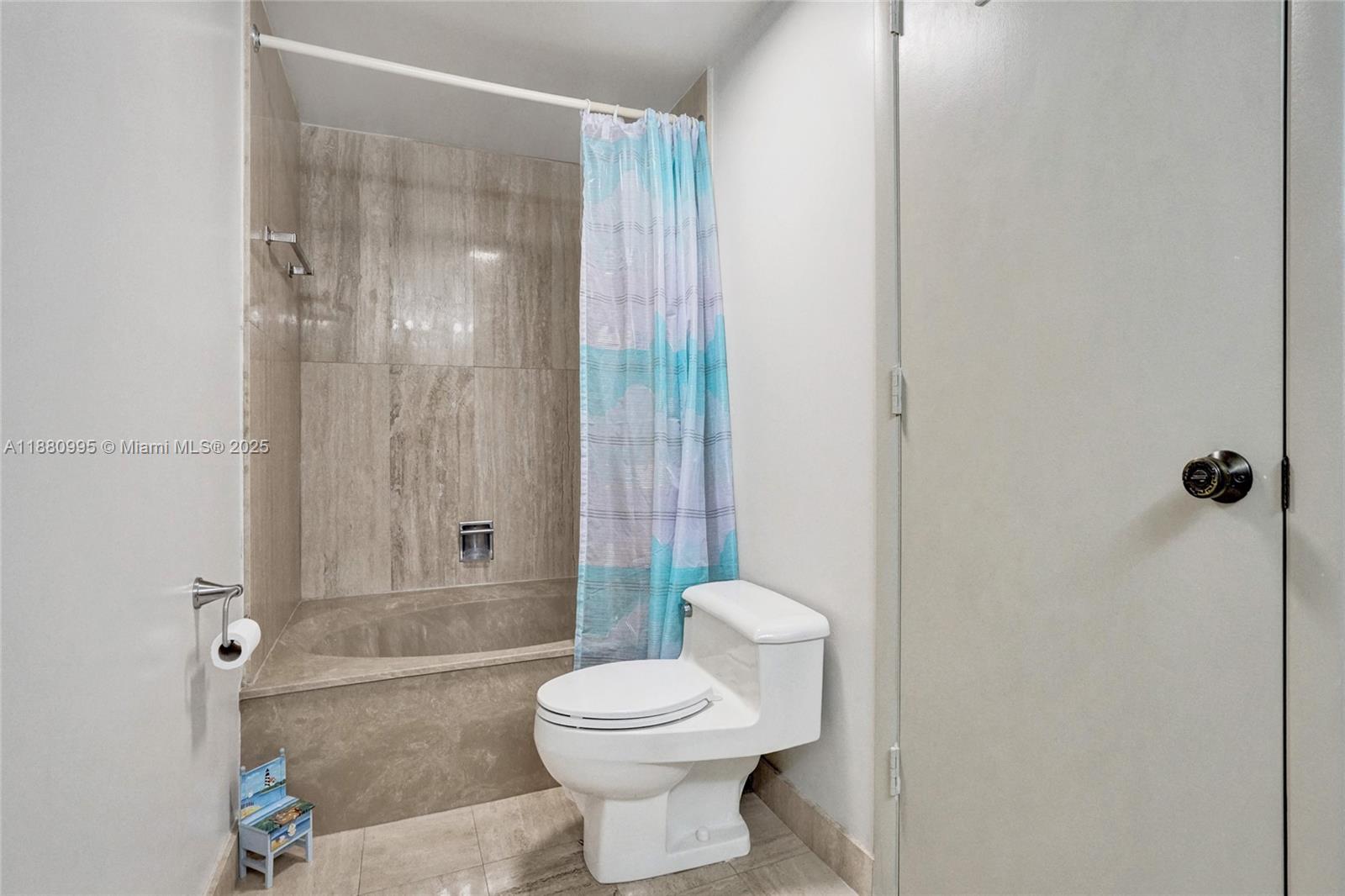 1201 South Ocean Drive, Unit 1010S Hollywood, FL 33019 - Photo 27 of 41 a bathroom with a toilet a sink and shower