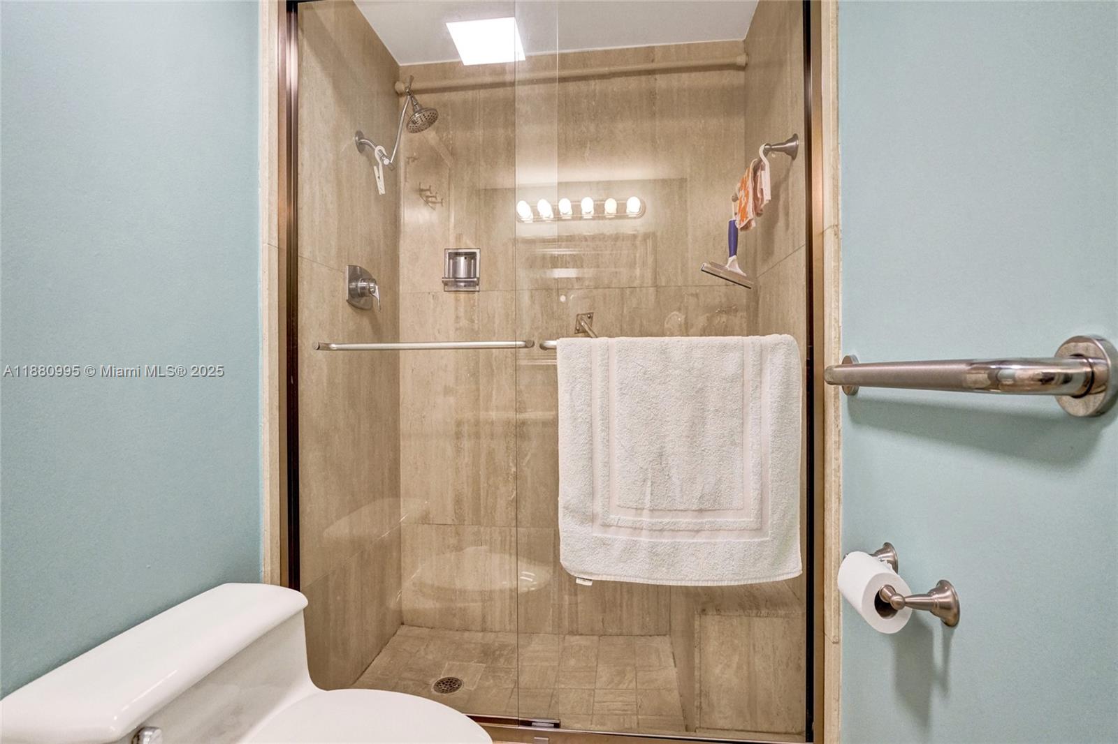 1201 South Ocean Drive, Unit 1010S Hollywood, FL 33019 - Photo 32 of 41 a bathroom with a shower and toilet