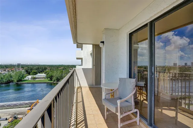 a view of balcony with furniture