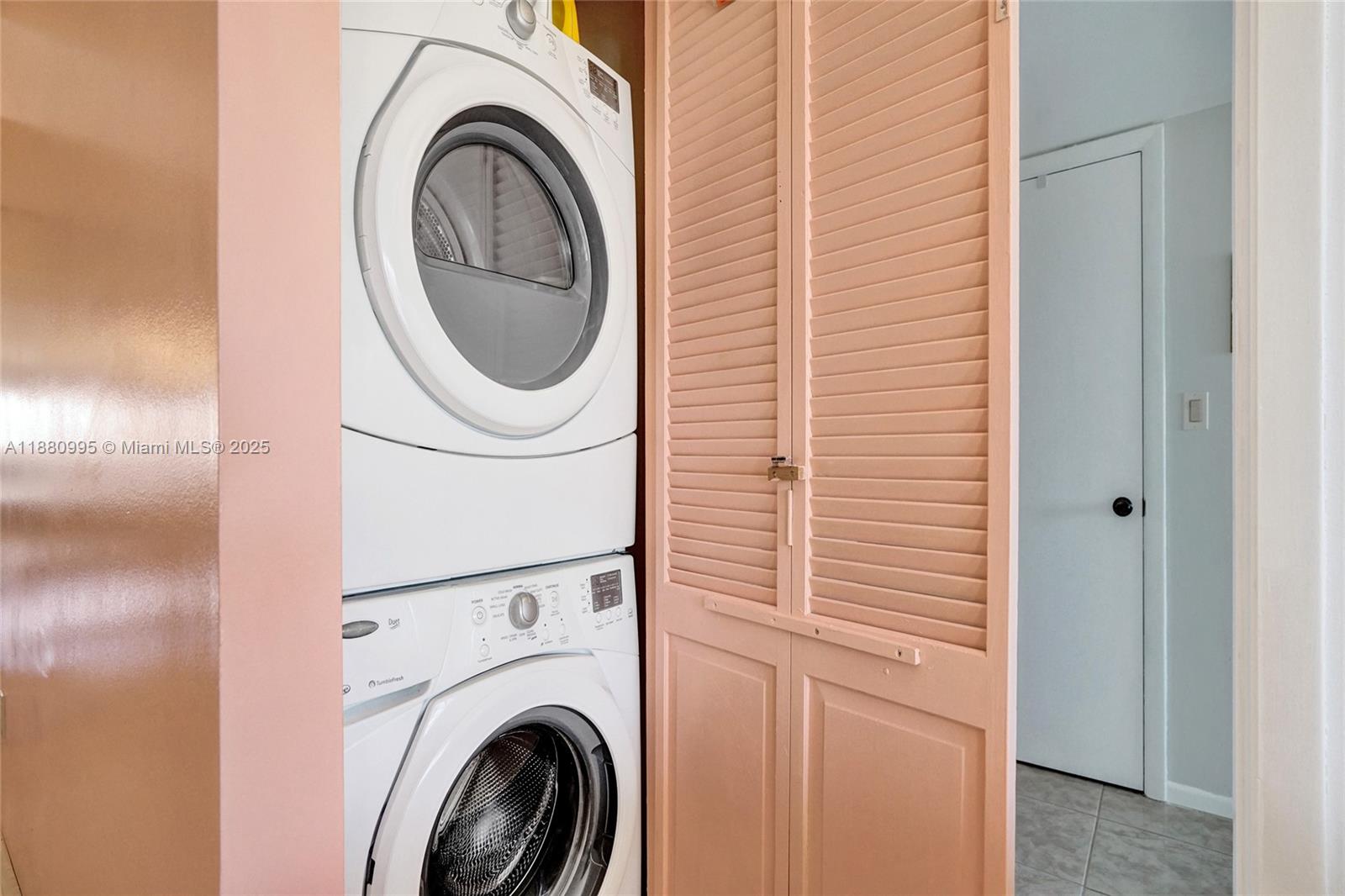 1201 South Ocean Drive, Unit 1010S Hollywood, FL 33019 - Photo 41 of 41 a utility room with dryer and washer