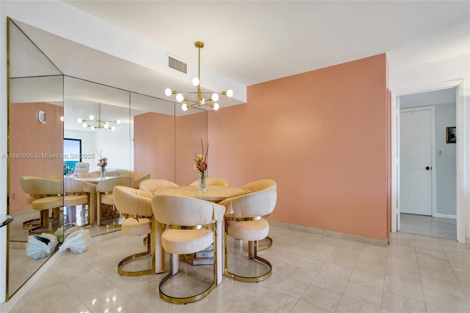 1201 South Ocean Drive, Unit 1010S Hollywood, FL 33019 - Photo 10 of 41 a view of a dining room with furniture