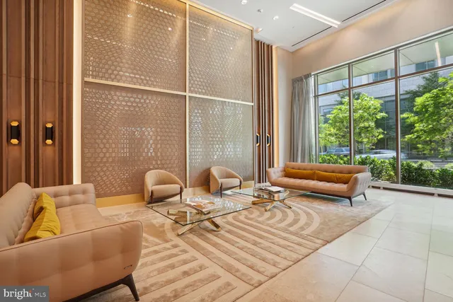 a bedroom with a bed and glass window