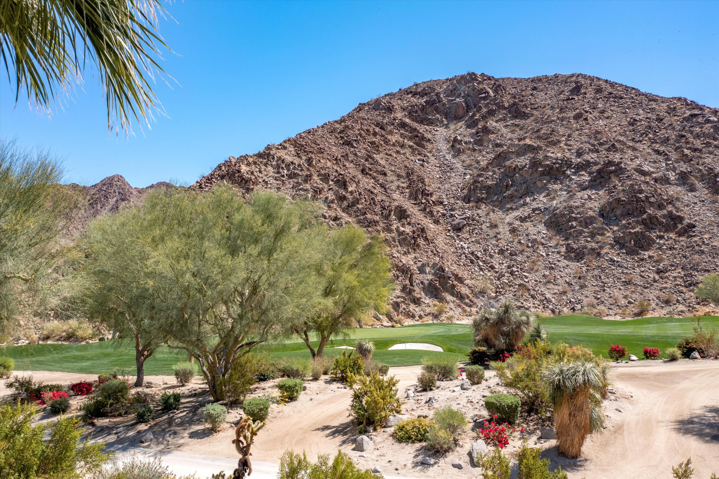 78411 Talking Rock Turn La Quinta, CA 92253 - Photo 22 of 70 a view of a pathway with a yard