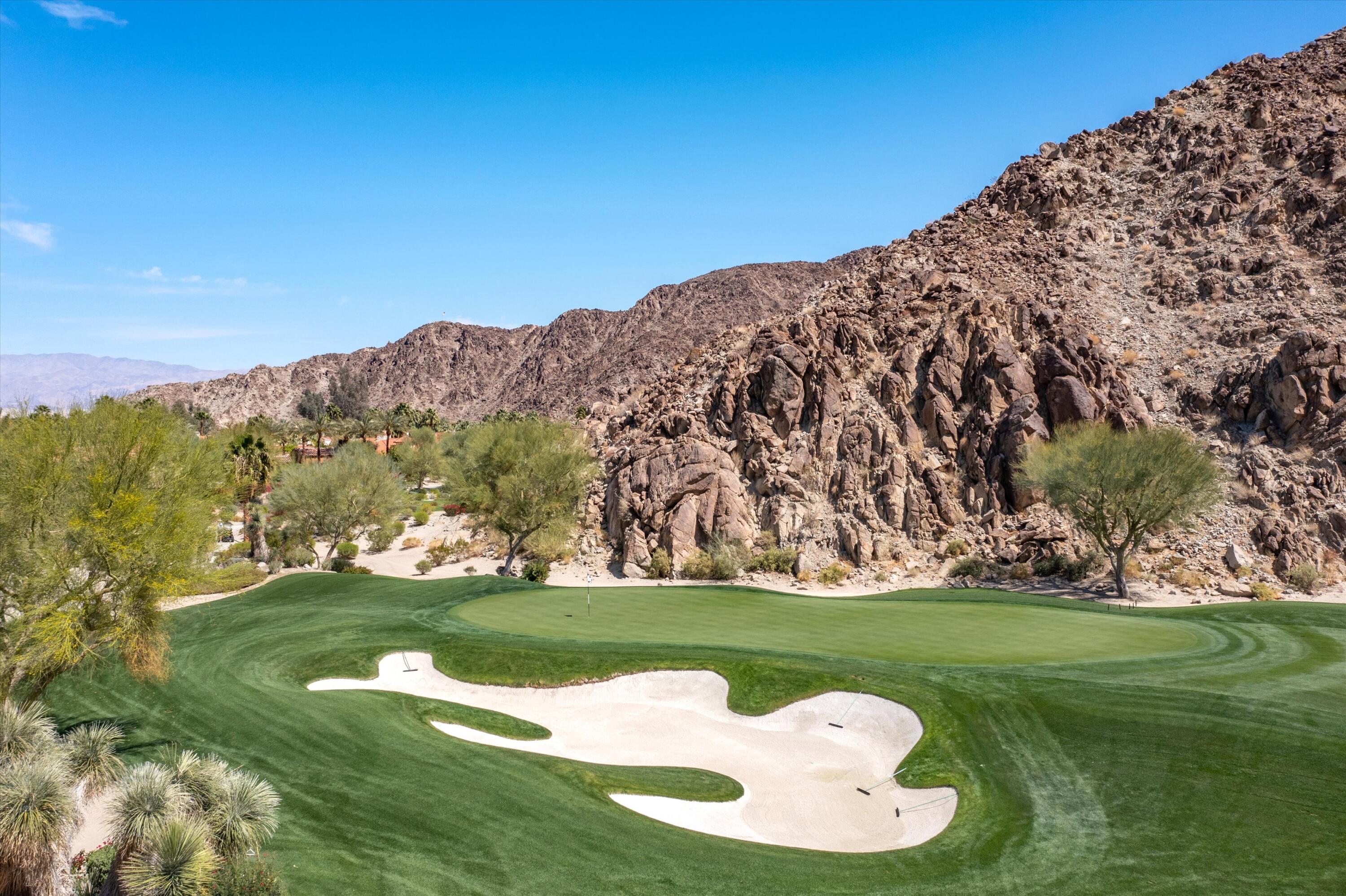 78411 Talking Rock Turn La Quinta, CA 92253 - Photo 23 of 70 a view of a golf course with a garden