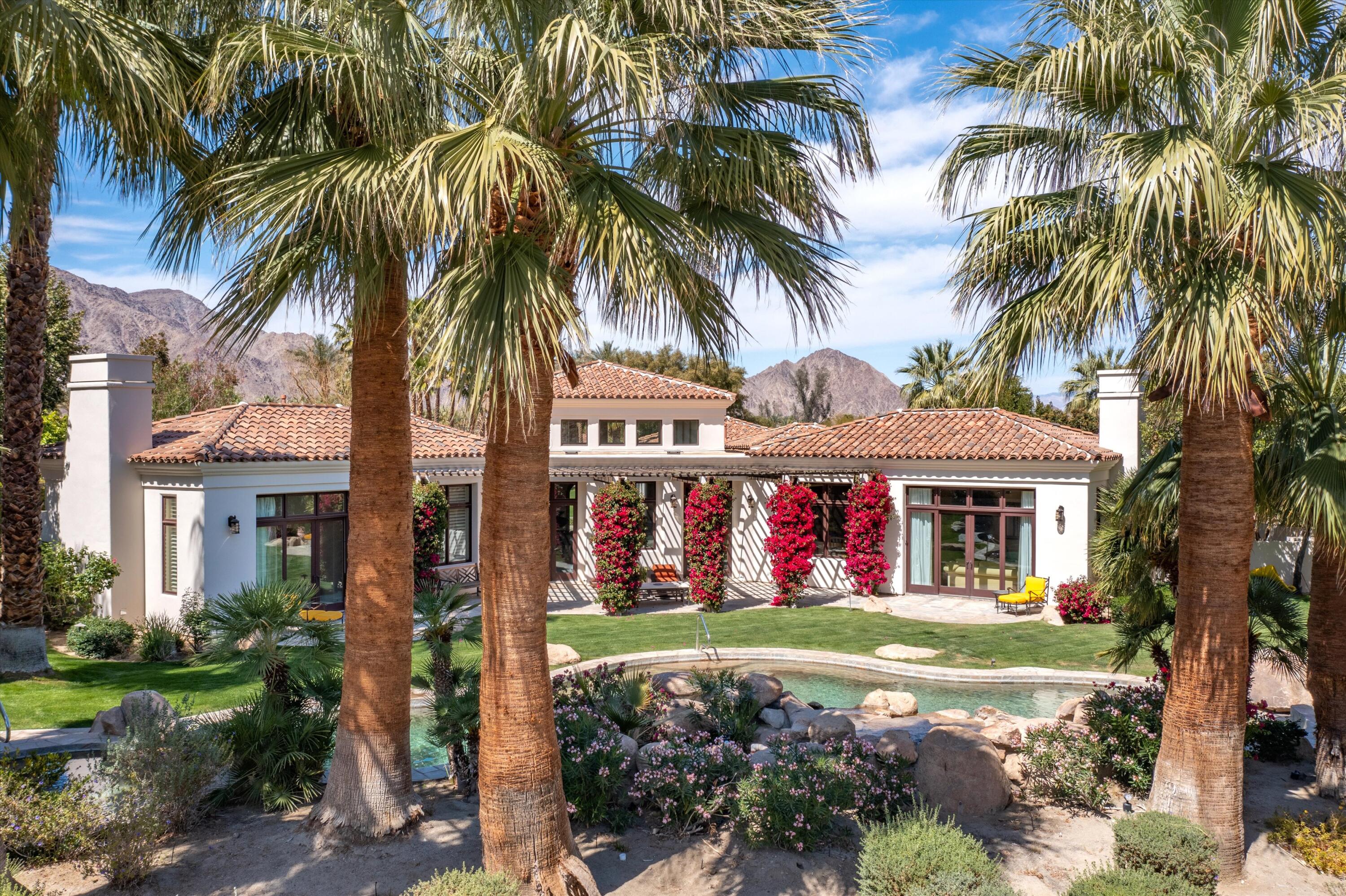 78411 Talking Rock Turn La Quinta, CA 92253 - Photo 26 of 70 a front view of house with yard and green space
