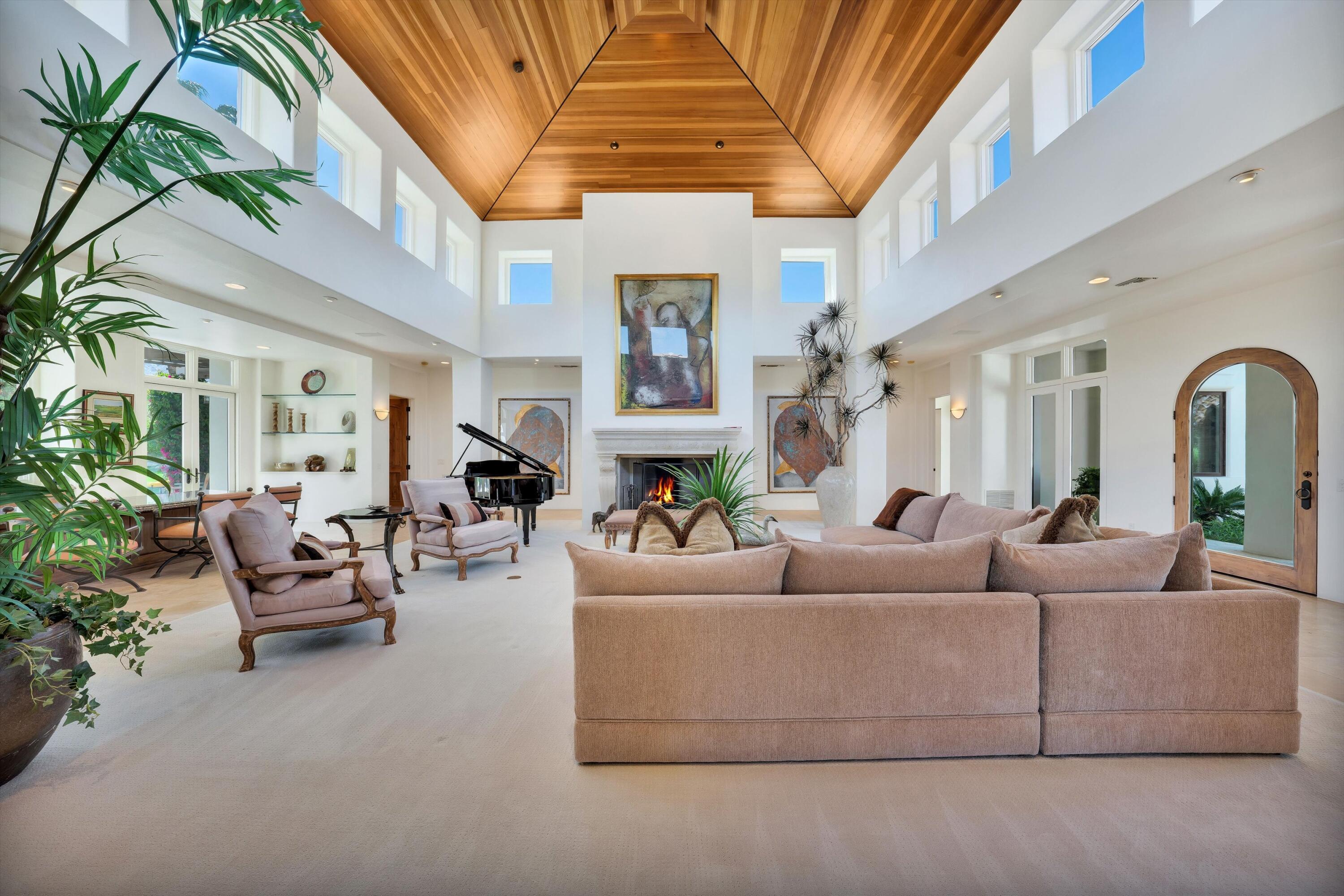 78411 Talking Rock Turn La Quinta, CA 92253 - Photo 34 of 70 a living room with furniture and a large window