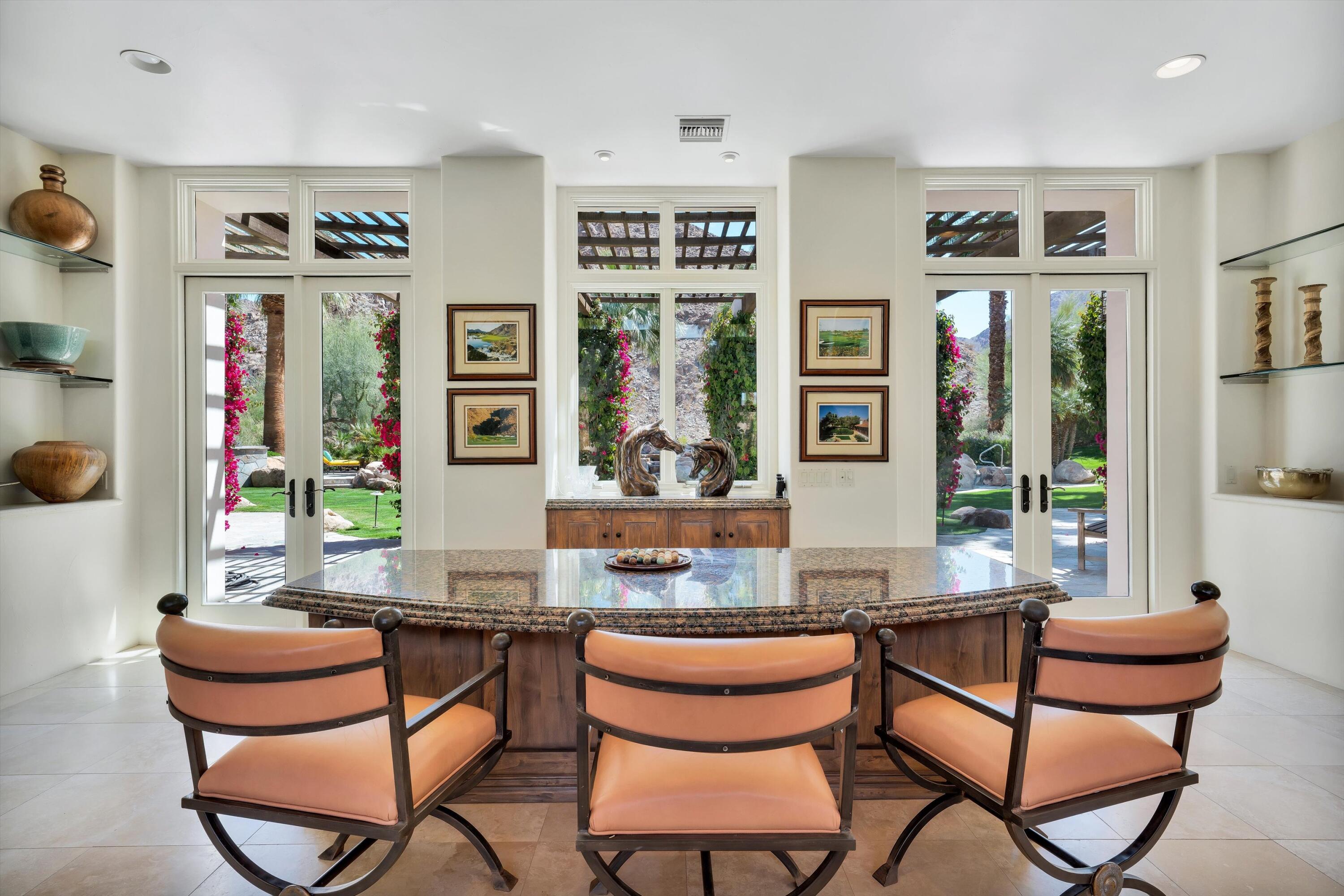 78411 Talking Rock Turn La Quinta, CA 92253 - Photo 40 of 70 a dining room with furniture and window