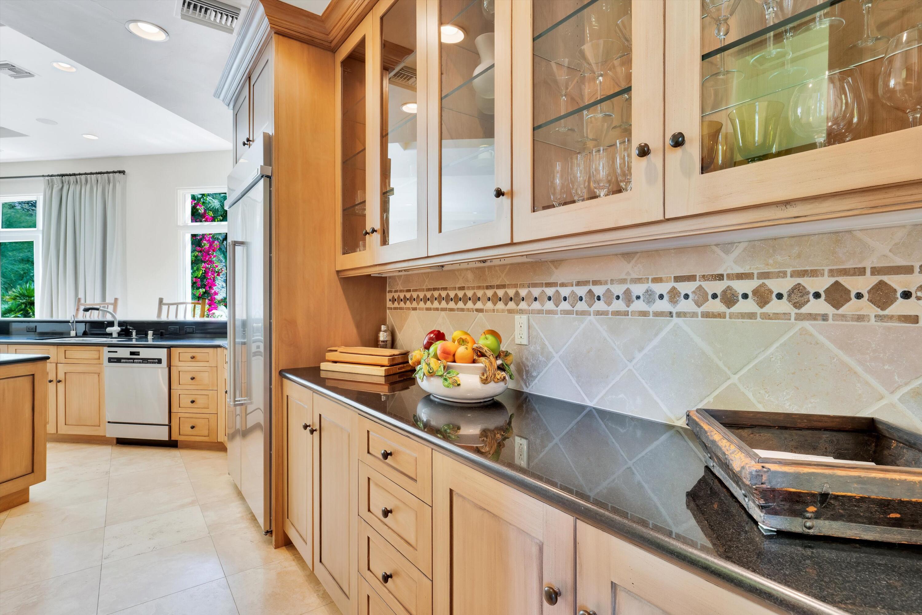 78411 Talking Rock Turn La Quinta, CA 92253 - Photo 46 of 70 a kitchen with stainless steel appliances a sink and a stove