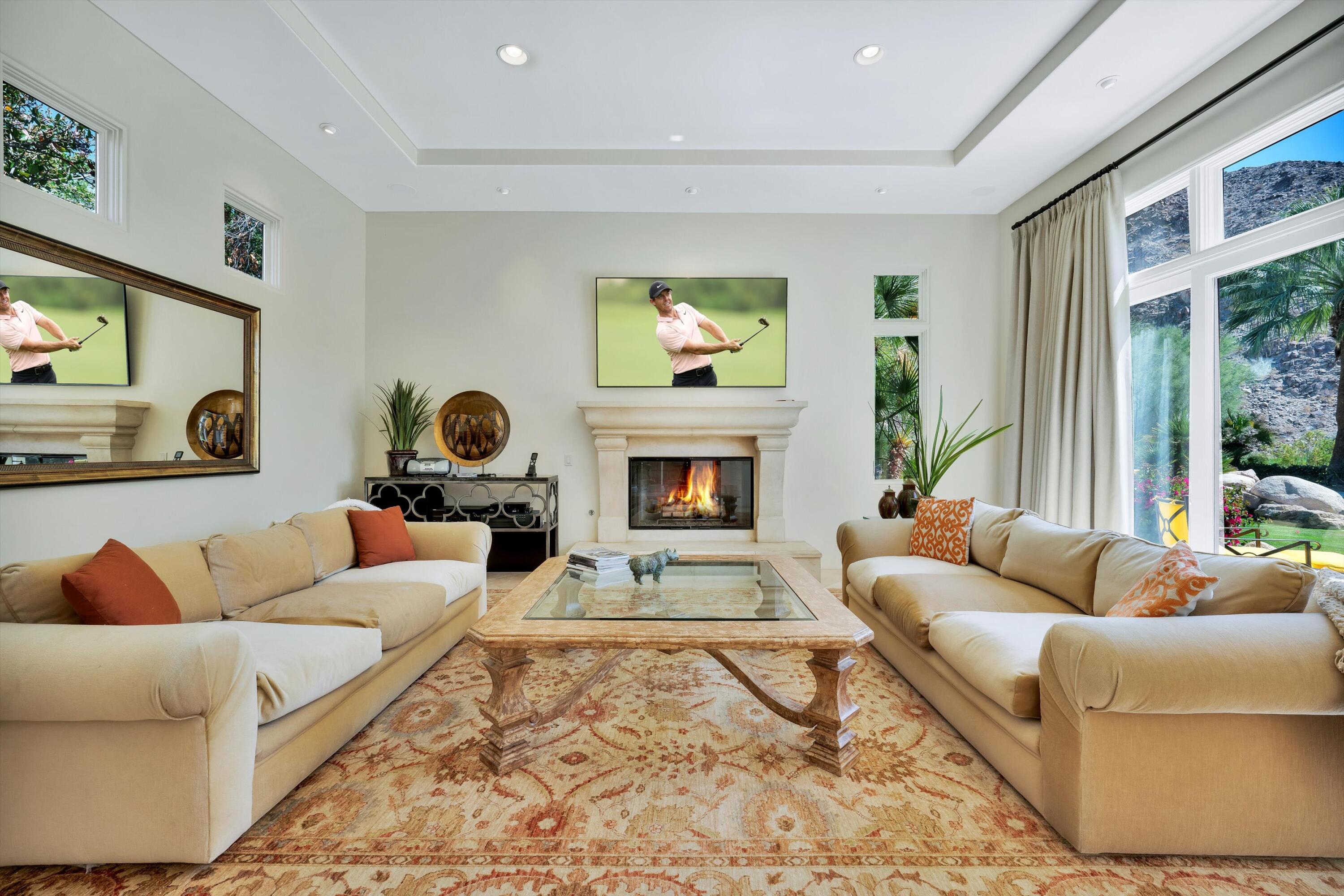 78411 Talking Rock Turn La Quinta, CA 92253 - Photo 48 of 70 a living room with furniture and a fireplace
