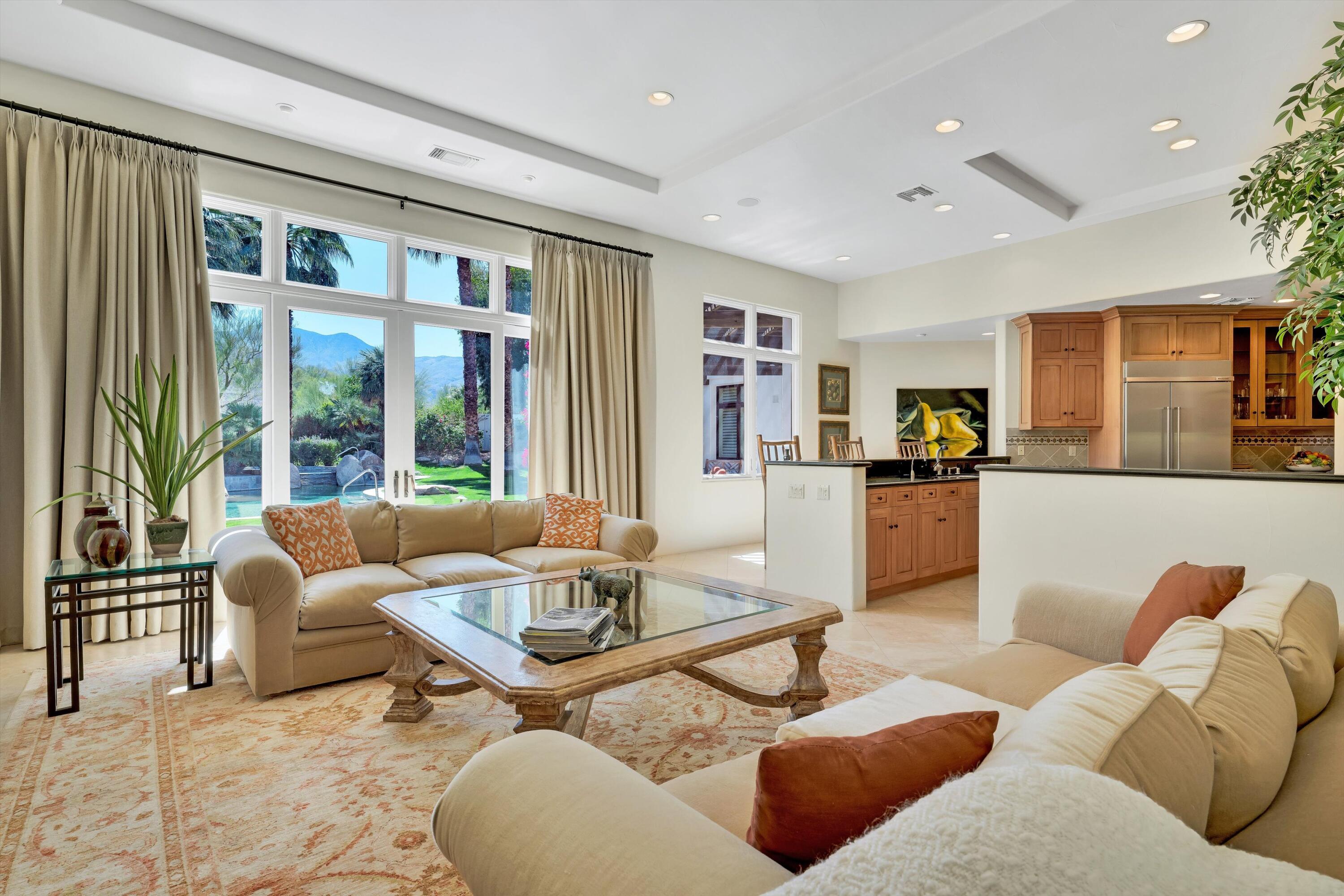78411 Talking Rock Turn La Quinta, CA 92253 - Photo 50 of 70 a living room with furniture and a large window